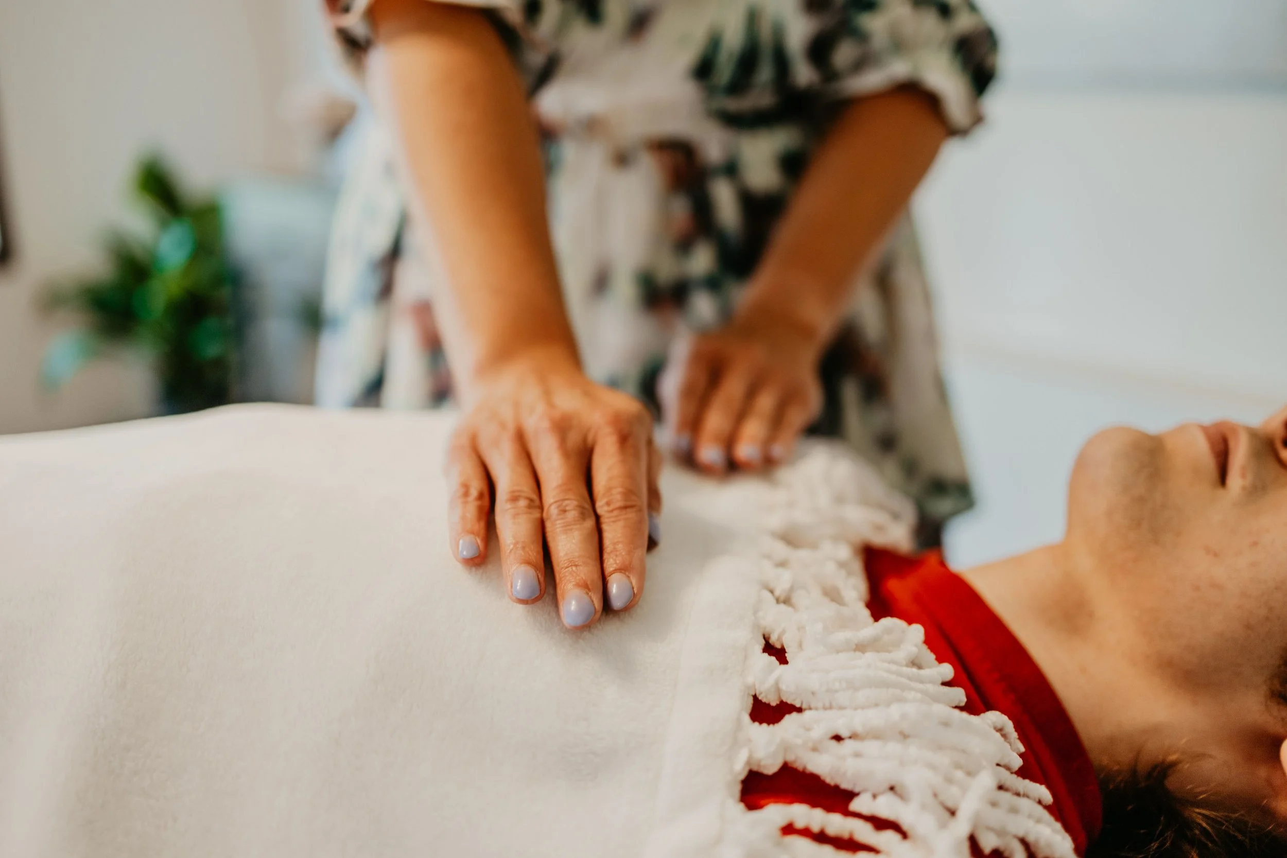 A relaxing Reiki session in progress, promoting energy balance and stress relief at Serenity Reiki by Mel in Red Deer