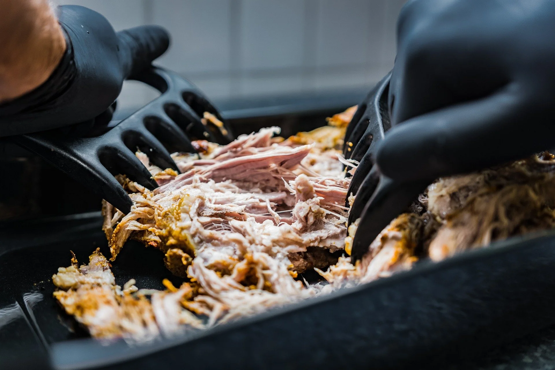 Low and slow cooking, smoked pulled pork shoulder