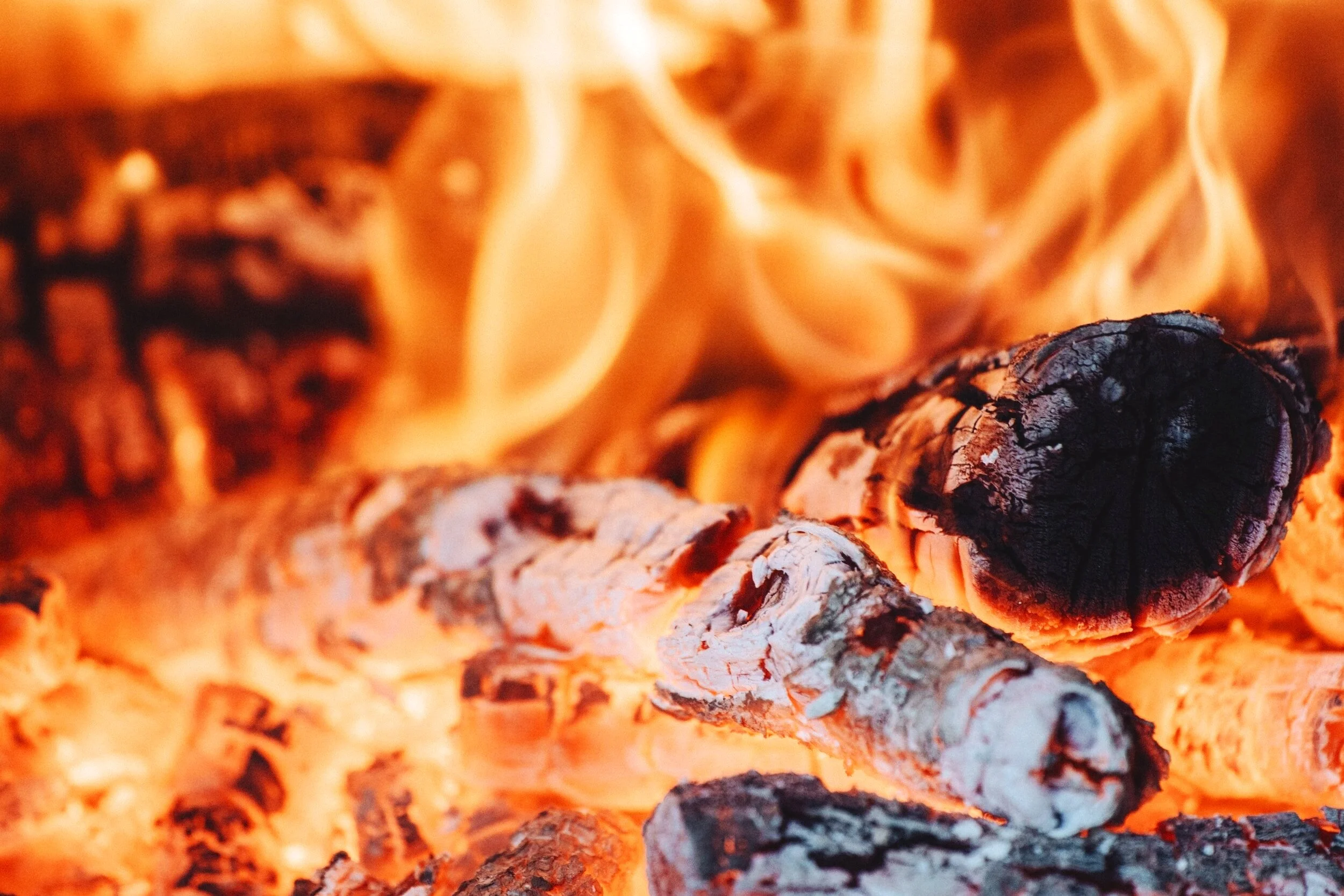Smoking wood fire logs