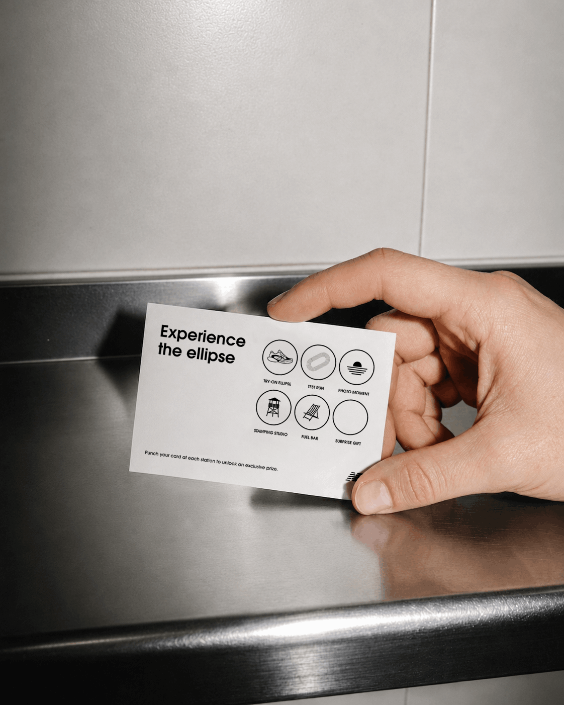 Event punch card featuring branded activity icons for a conceptual New Balance experiential retail activation.