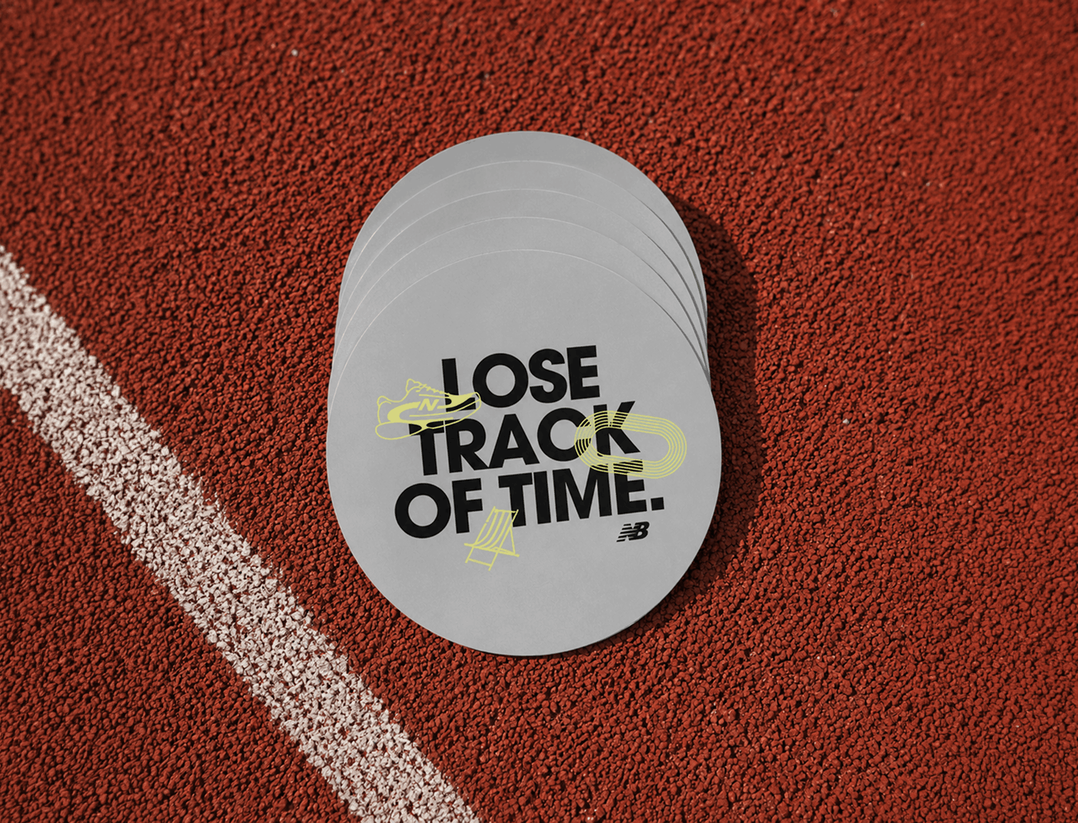 Branded stickers showcasing campaign artwork for a conceptual New Balance experiential marketing activation.