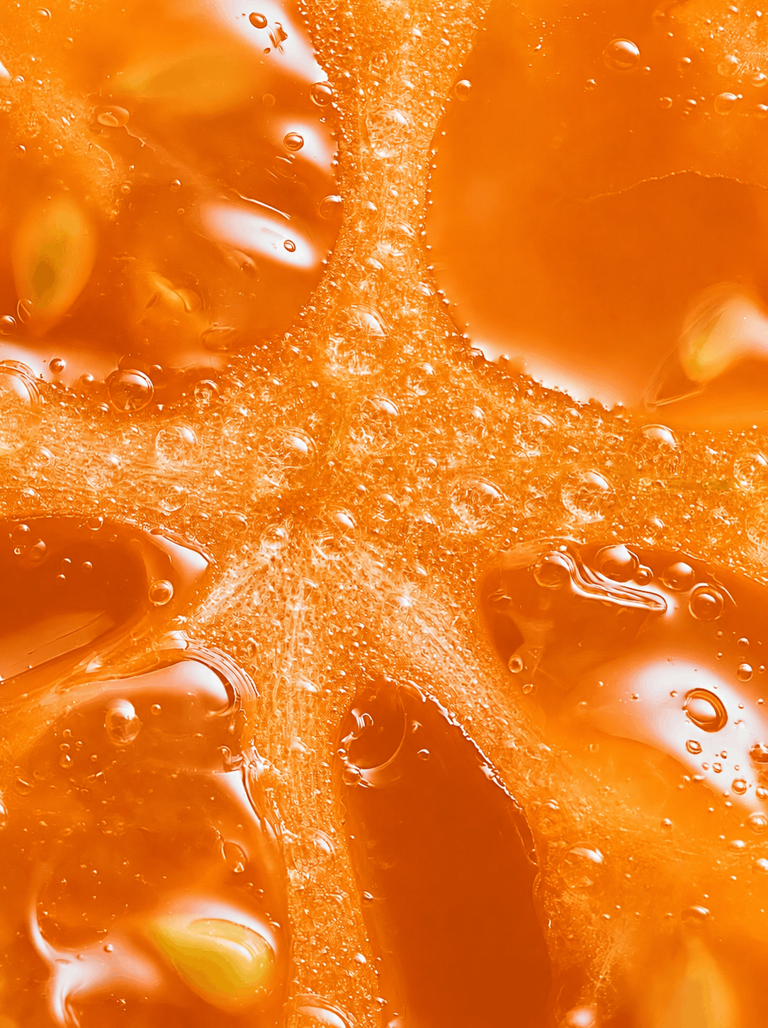 AI-generated macro photograph of an orange heirloom tomato, highlighting vibrant color, texture, seeds, and freshness for a commercial food campaign.