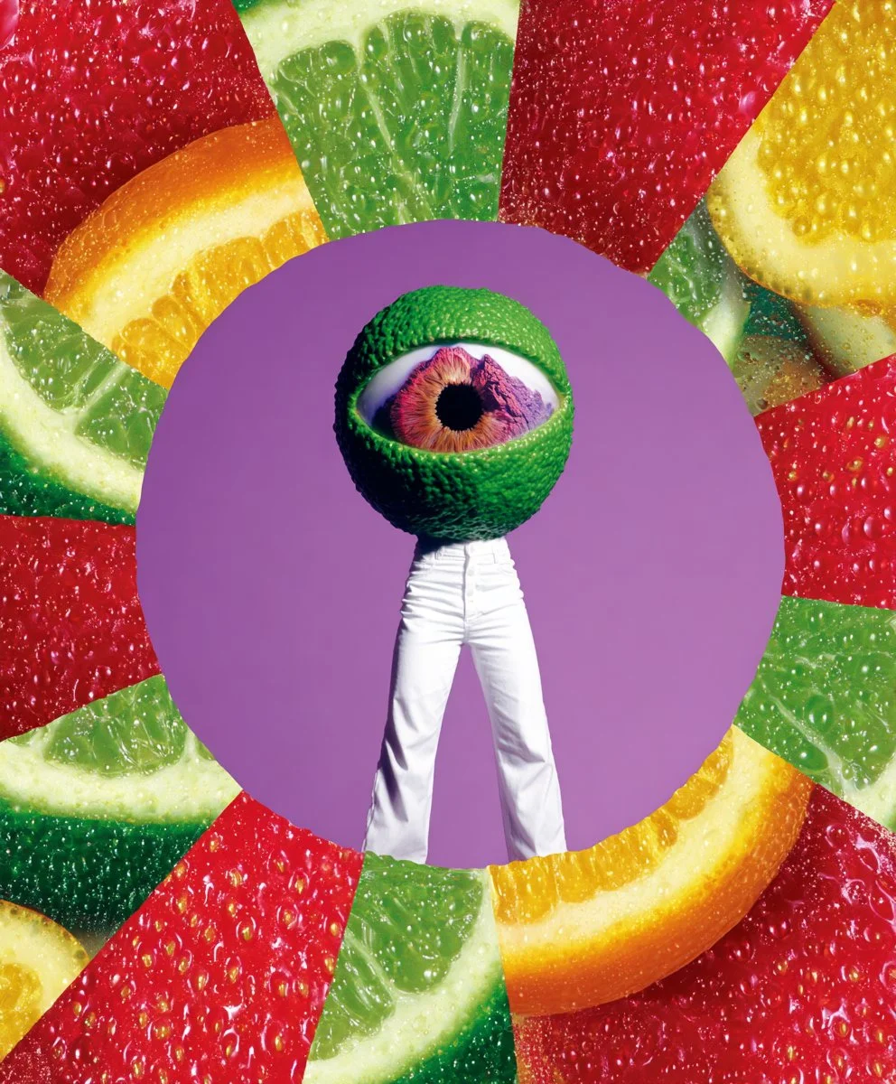 A surreal digital collage featuring a person with a green citrus fruit for a head, containing a human eye, set against a purple background. The circle is surrounded by slices of colorful citrus fruits including strawberries, oranges, lemons, and kiwi