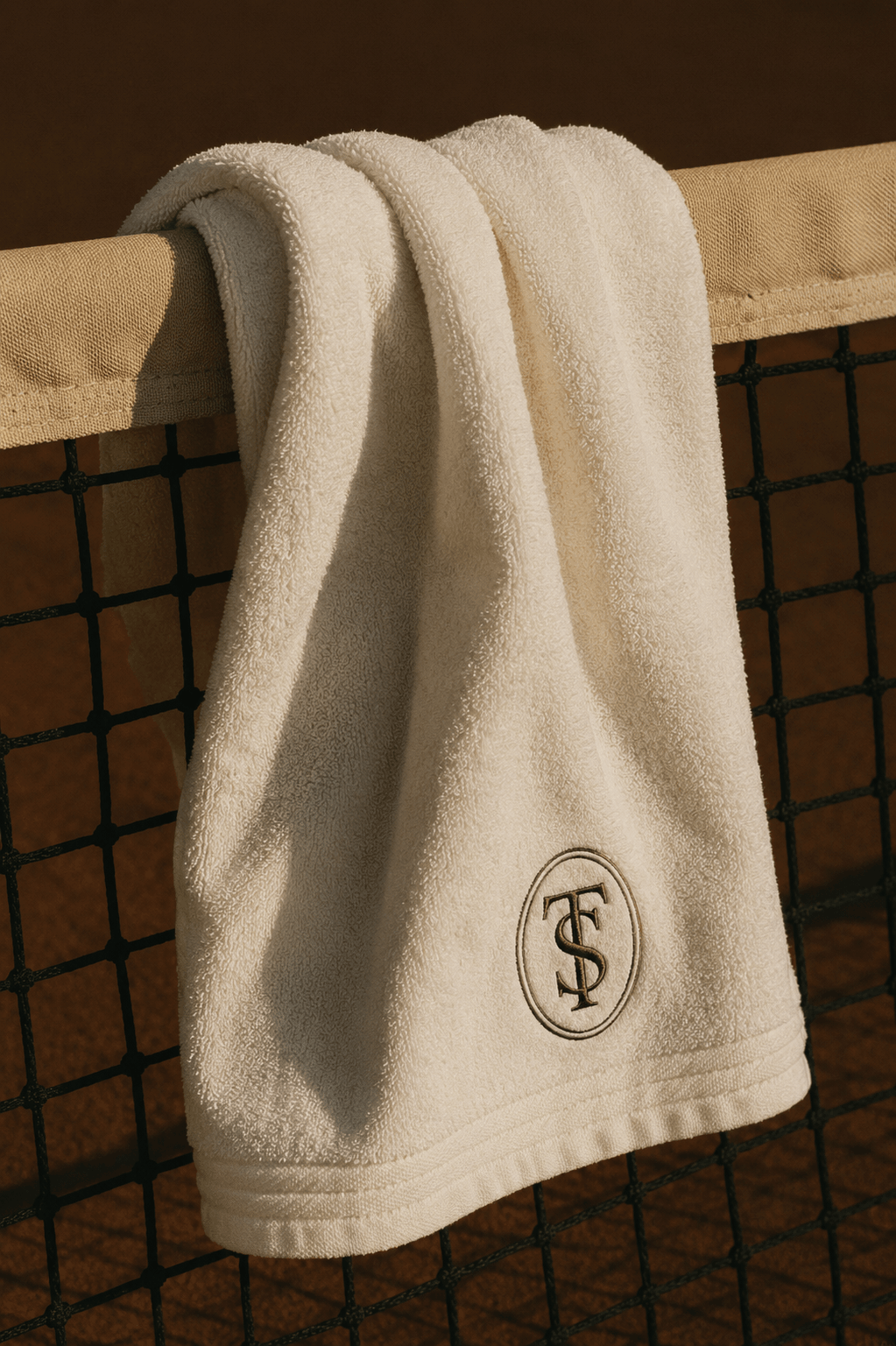 AI-designed embroidered tennis towel created for The Seabrook country club, highlighting premium hospitality branding, merchandise design, and luxury lifestyle creative direction.
