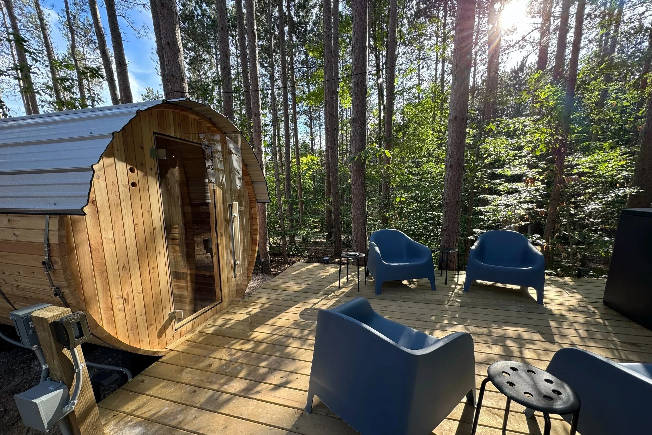 All Glamp Michigan glamping stays have private amenities, including a sauna, cold plunge, hot tub and fire pit.