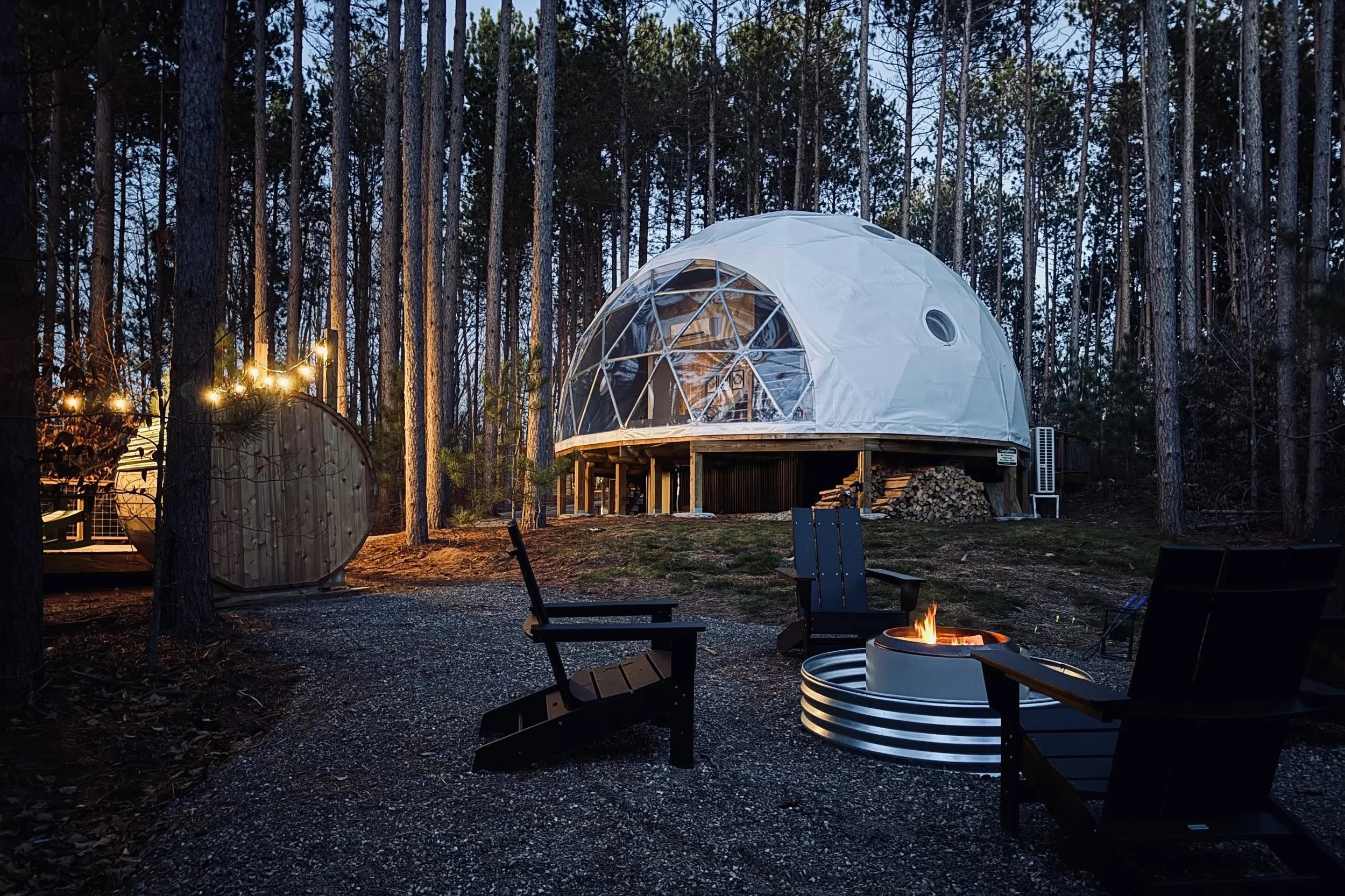 Glamp Michigan's Löyly Dome is located in Benzonia, Michigan. It's a luxury glamping dome.