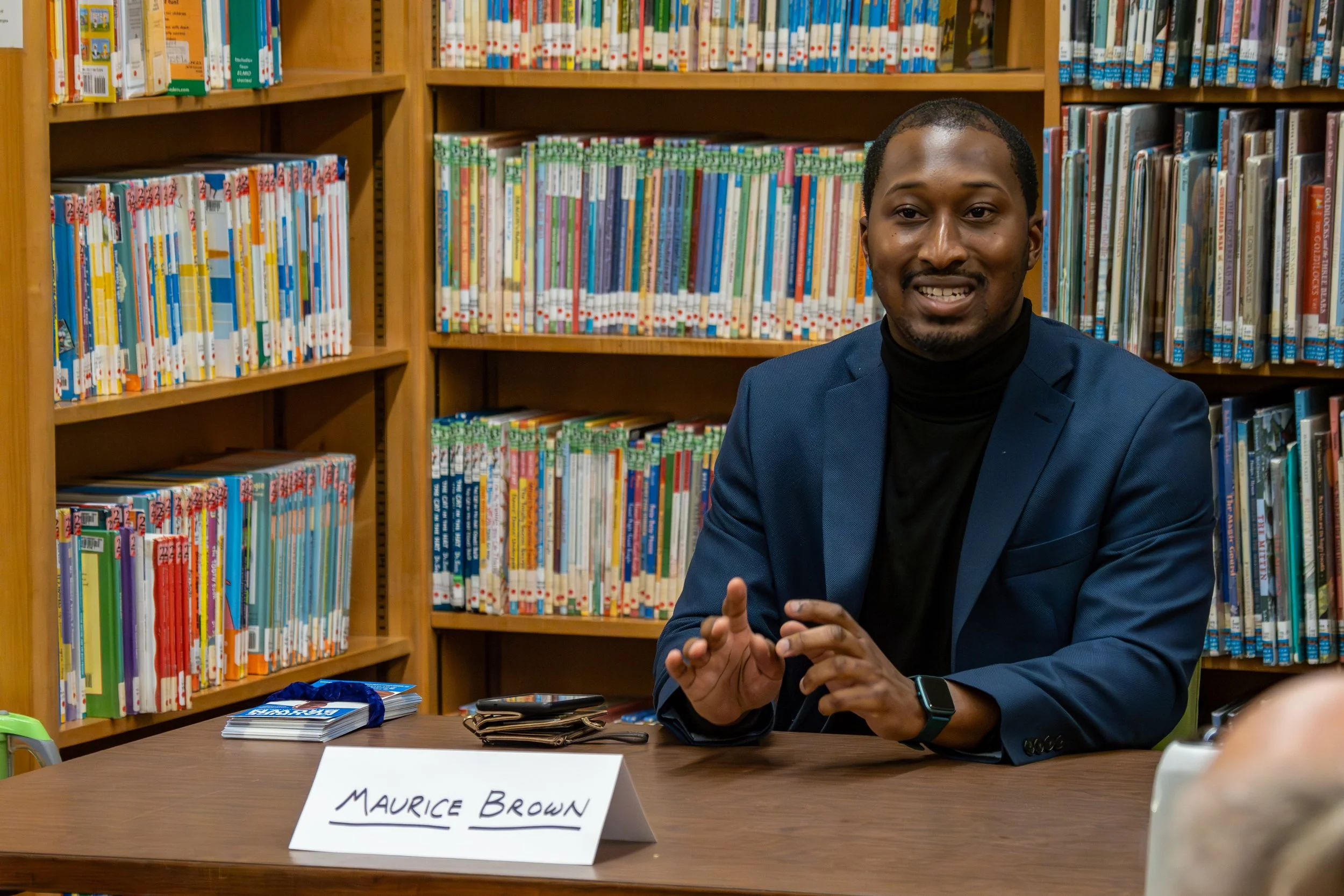 Guest speaker in library setting