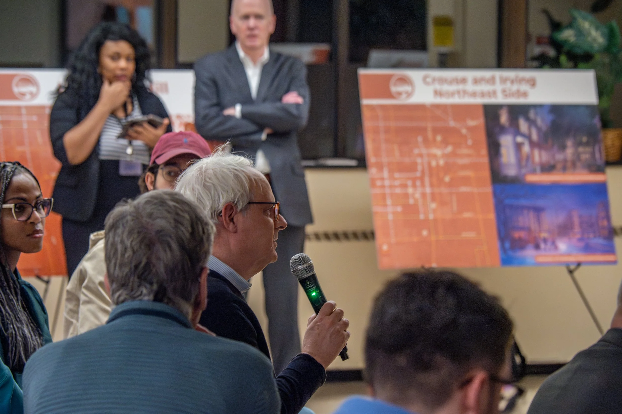 Audience Q&A at a community meeting