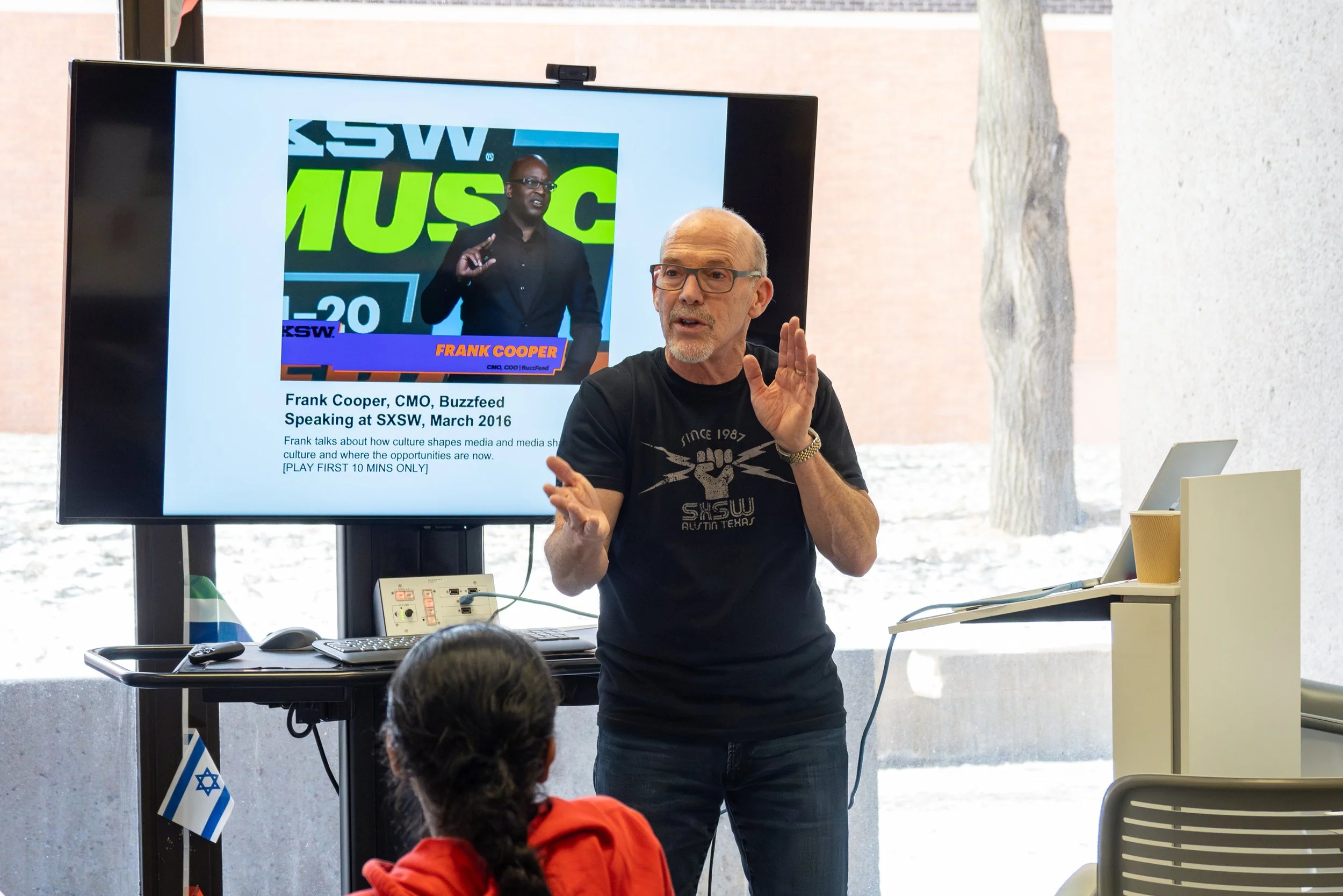 Speaker presenting to class