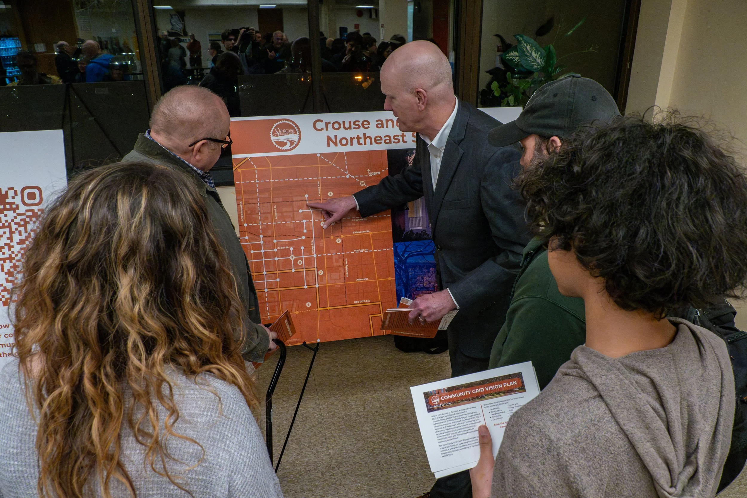 Community member pointing at planning map