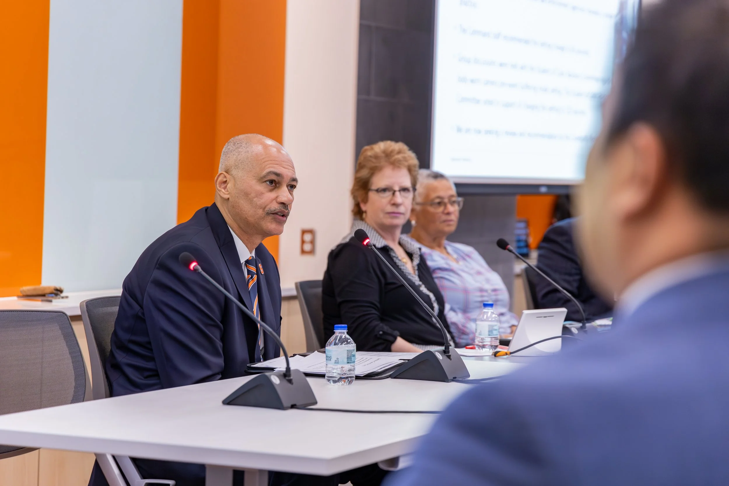 Board members in discussion