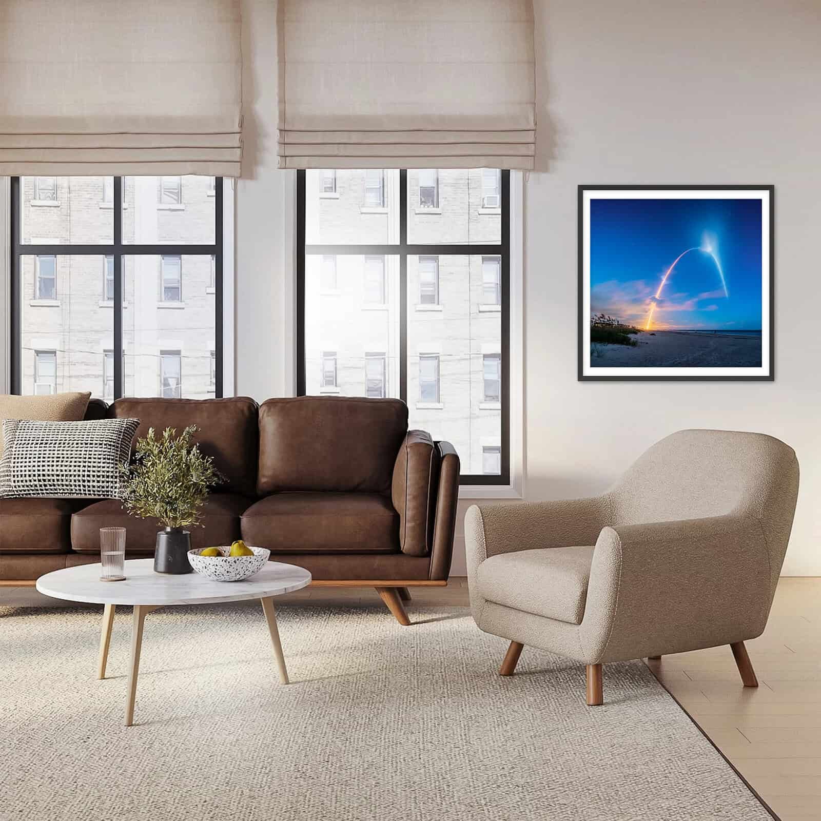 brilliant colors of blue and orange in night time launch print against blue background in living room