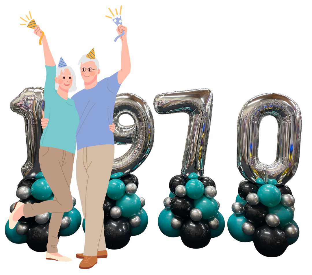 A couple celebrating with balloon numbers '2020', decorated with teal, black, and silver balloons, against a red backdrop.