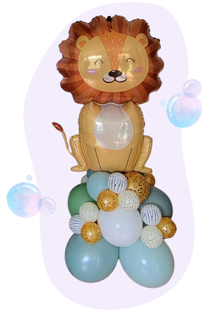 Balloon sculpture of a smiling lion with a mane, sitting on a cluster of colorful balloons arranged to resemble rocks or clouds, with a playful background.