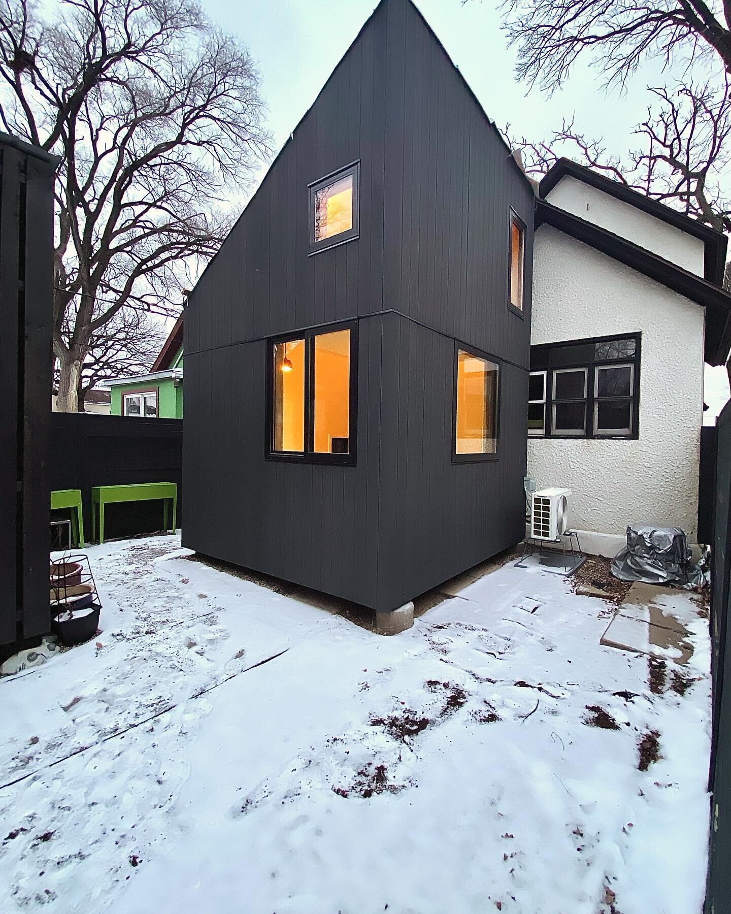 Construction timelapse of tiny house addition in North East Minneapolis.  The minimalist look of the addition is achieved with a dark grey finish on nickel gap cedar siding, achieving a Japanese Shou Sugi Ban aesthetic. The edges are detailed with cu