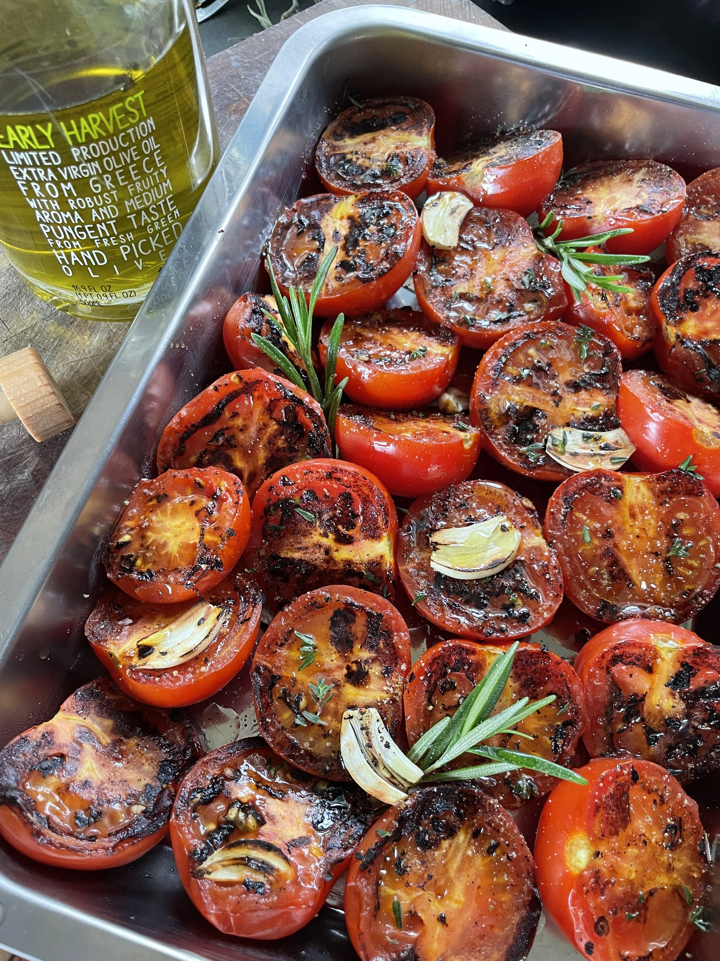 Wood fired grilled tomatoes are part of the island style B.B.Q. delivered right to your vacation villa.