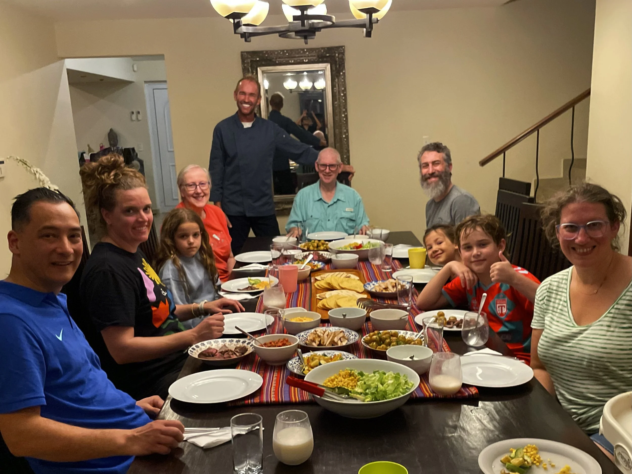 An upscale dinner is served family style at a vacation villa in Aruba.
