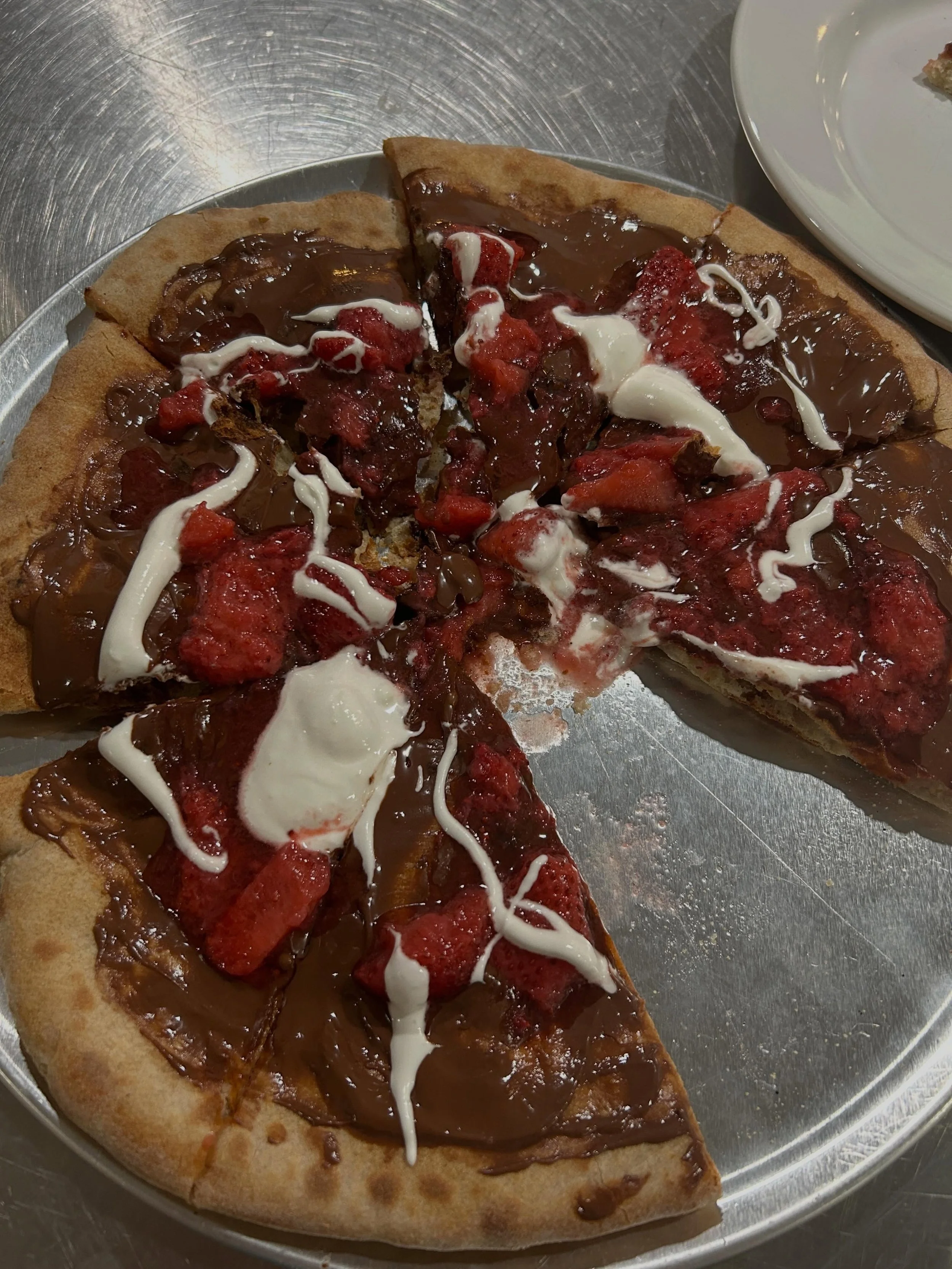 Dessert pizza on the menu this Memorial Day weekend! @thegoodcrust.maine dough baked in the wood oven, spread with delicious @nutella , topped with strawberries and drizzled with our secret sauce!! 😍

Spring Hours
Thursday 4-8pm
Friday, Saturday &am
