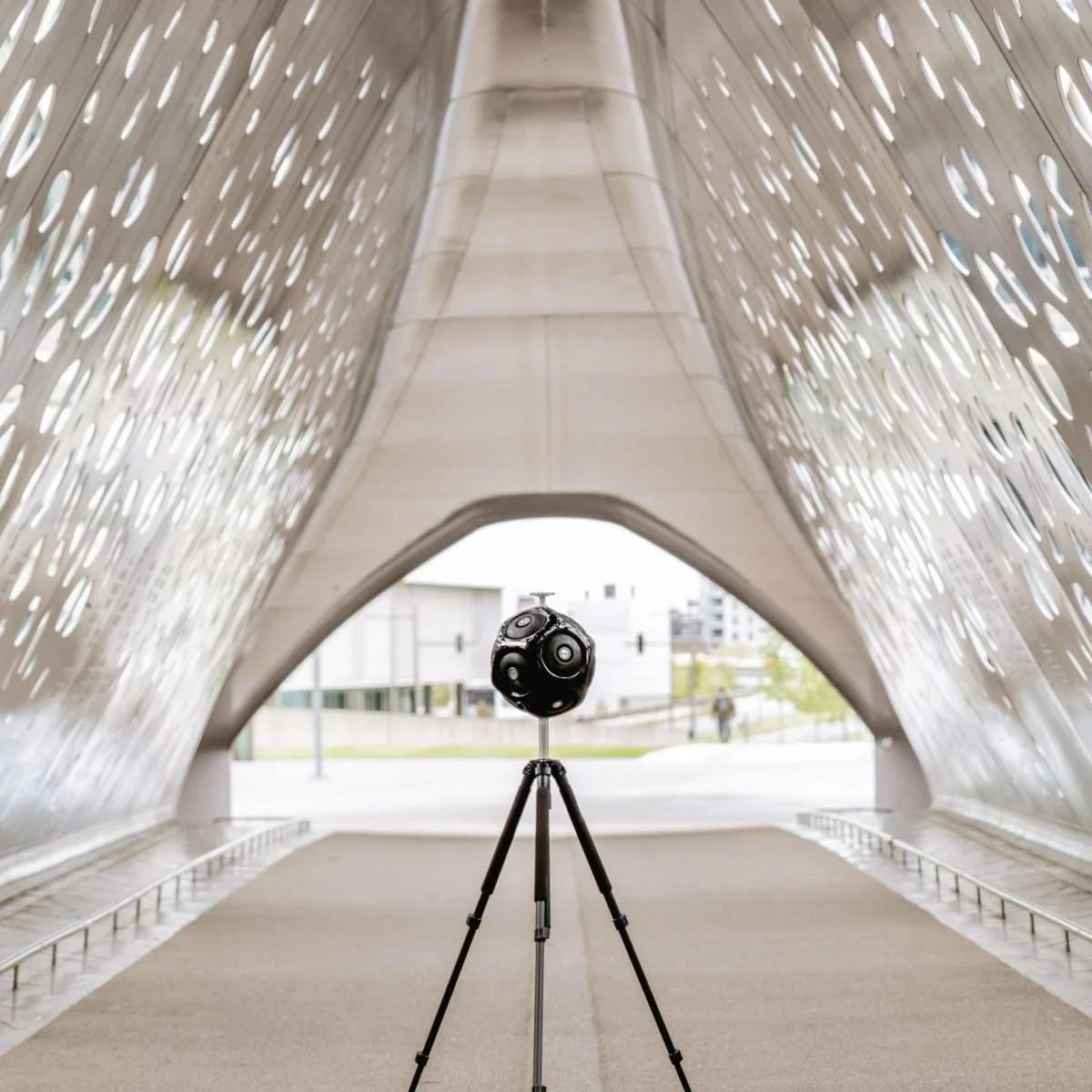 Qohm dodecahedron sound source on tripod for calibrated building acoustics testing