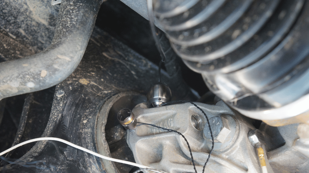 High-frequency shaker installed for automotive structural excitation testing