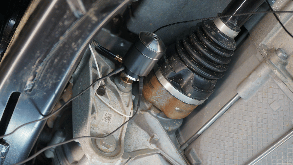 Integral shaker installed in tight space for repeatable automotive FRF measurements