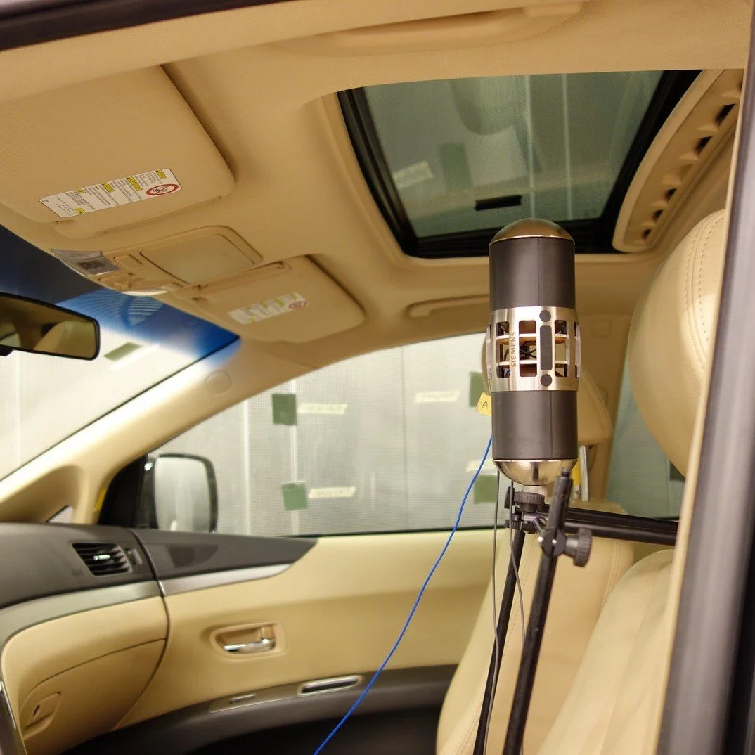 Qmed volume source installed in a vehicle cabin for acoustic and vibro-acoustic measurements