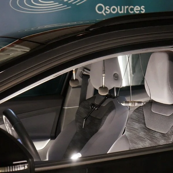 Qind2 volume source installed in a vehicle cabin for acoustic and vibro-acoustic measurements