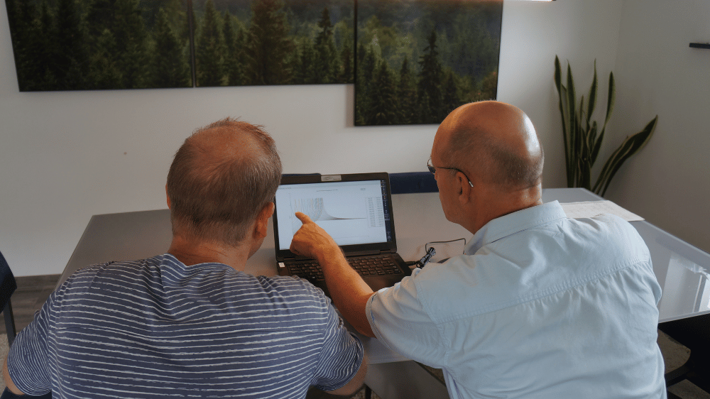 Qsources engineers reviewing measurement results and test data