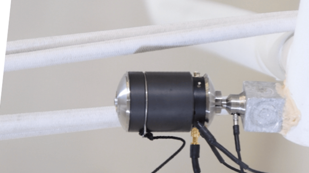 Qish integral shaker mounted on a test fixture for accurate FRF acquisition