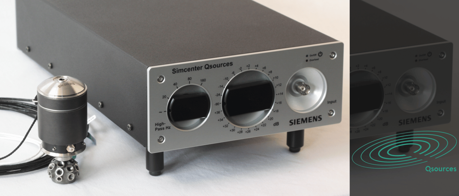 Qamp measurement amplifier shown with excitation equipment for noise and vibration testing