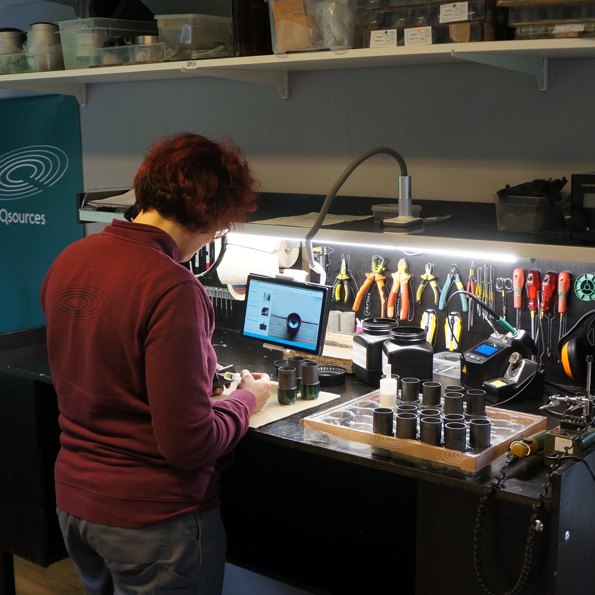 Qsources workshop assembly work with tools and components