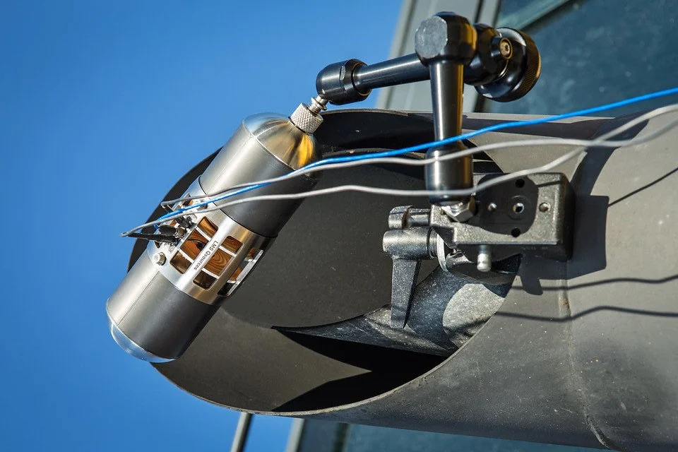 Volume sound source placement on tractor/exhaust for cabin interior reciprocity and transfer function measurements