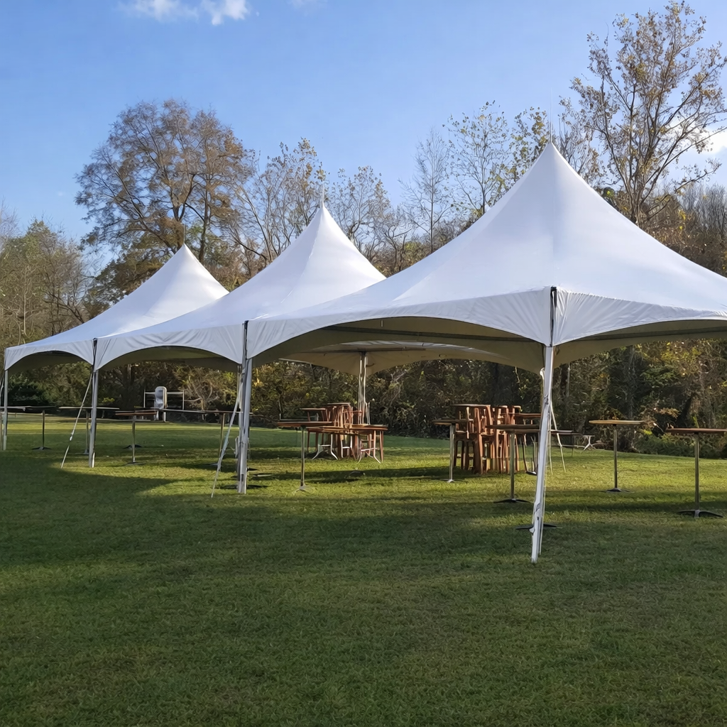 White outdoor event tents set up by LUJO Event Rentals for a private event in Northwest Washington.