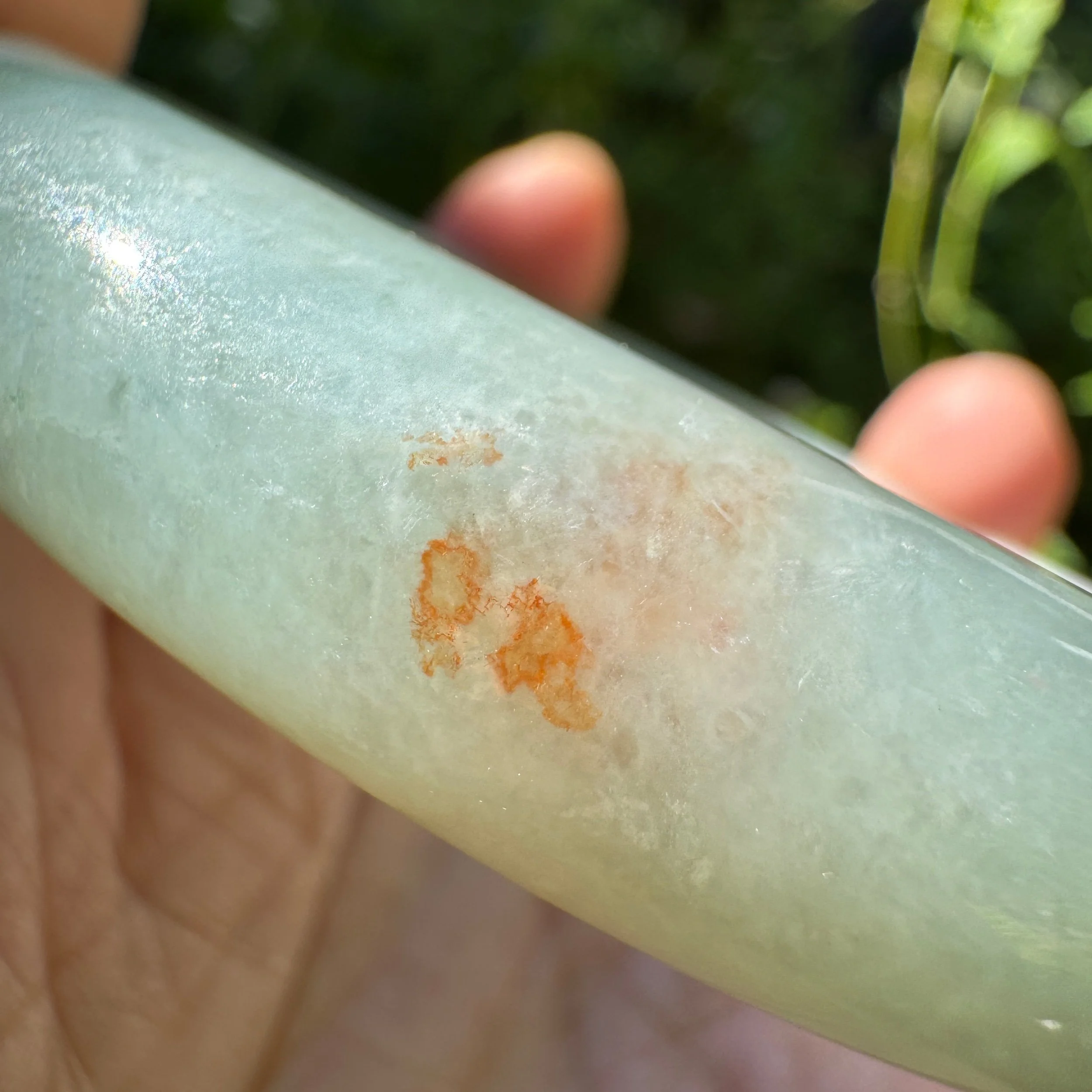 Charming natural reddish brown inclusions of the Type A Myanmar jadeite