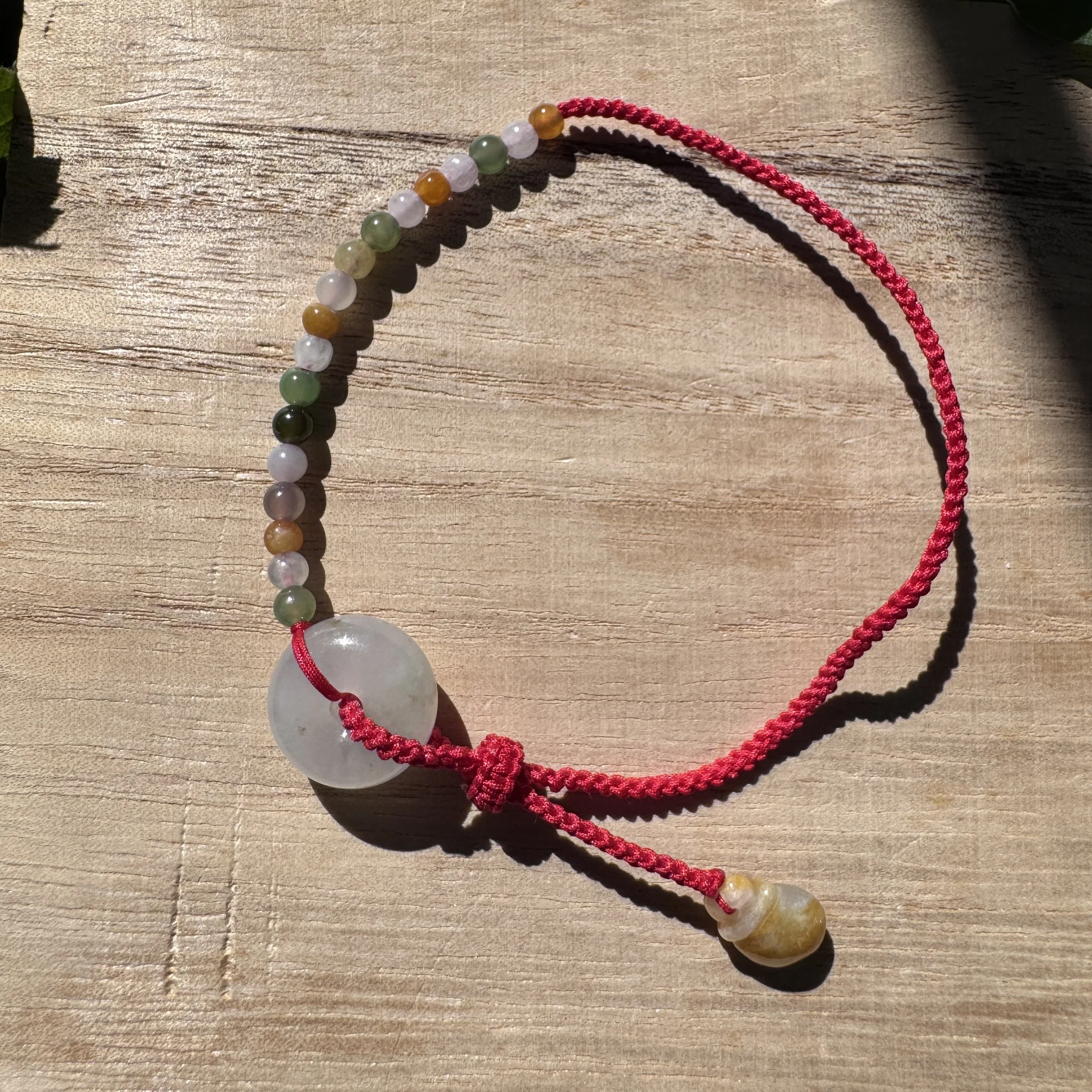 Hand braided dainty  Genuine 100% natural untreated jade charm lucky bracelet-donut (Ping An Kou )