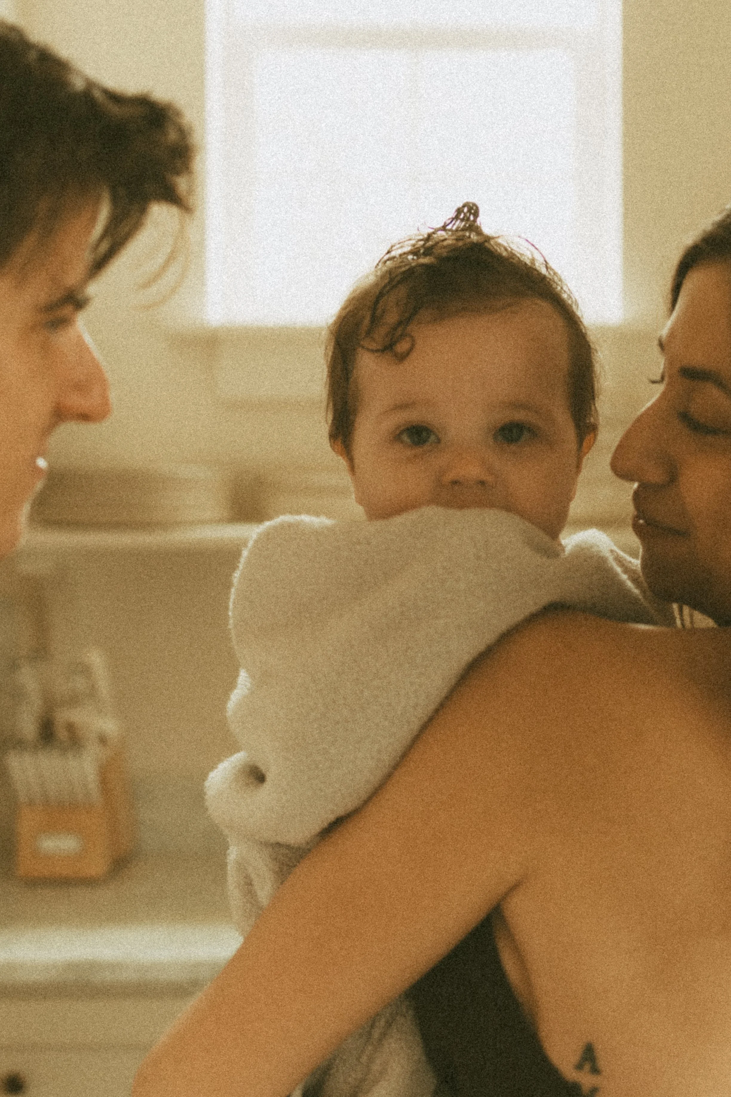 A family bathing their baby at an Airbnb in Hill Country, Texas