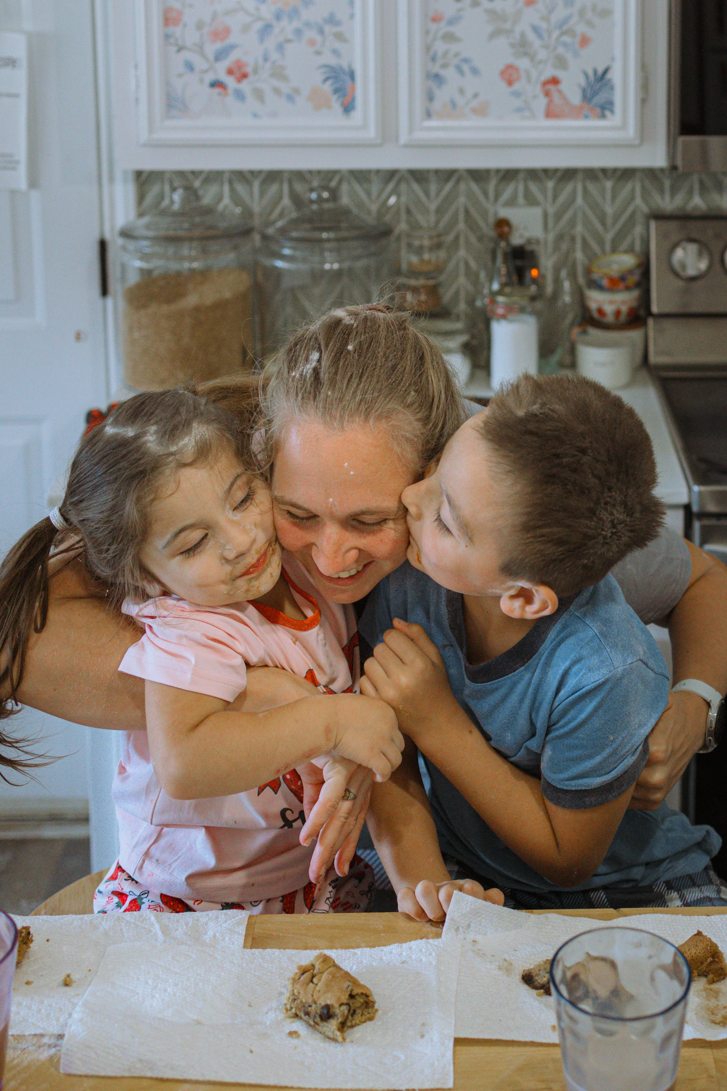 mom and kids baking cookies