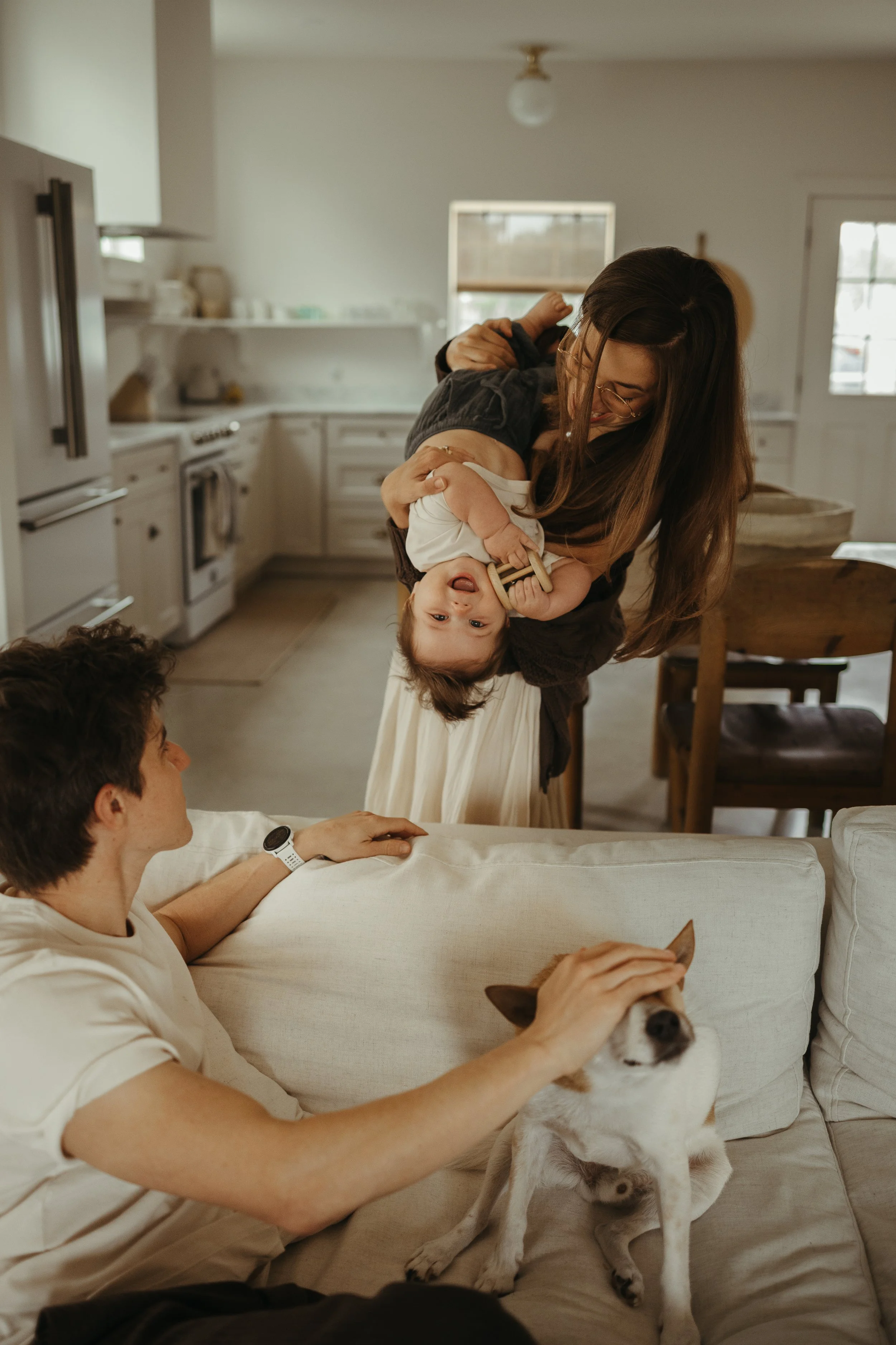 Family spending a slow morning together during an in-home documentary family photo session