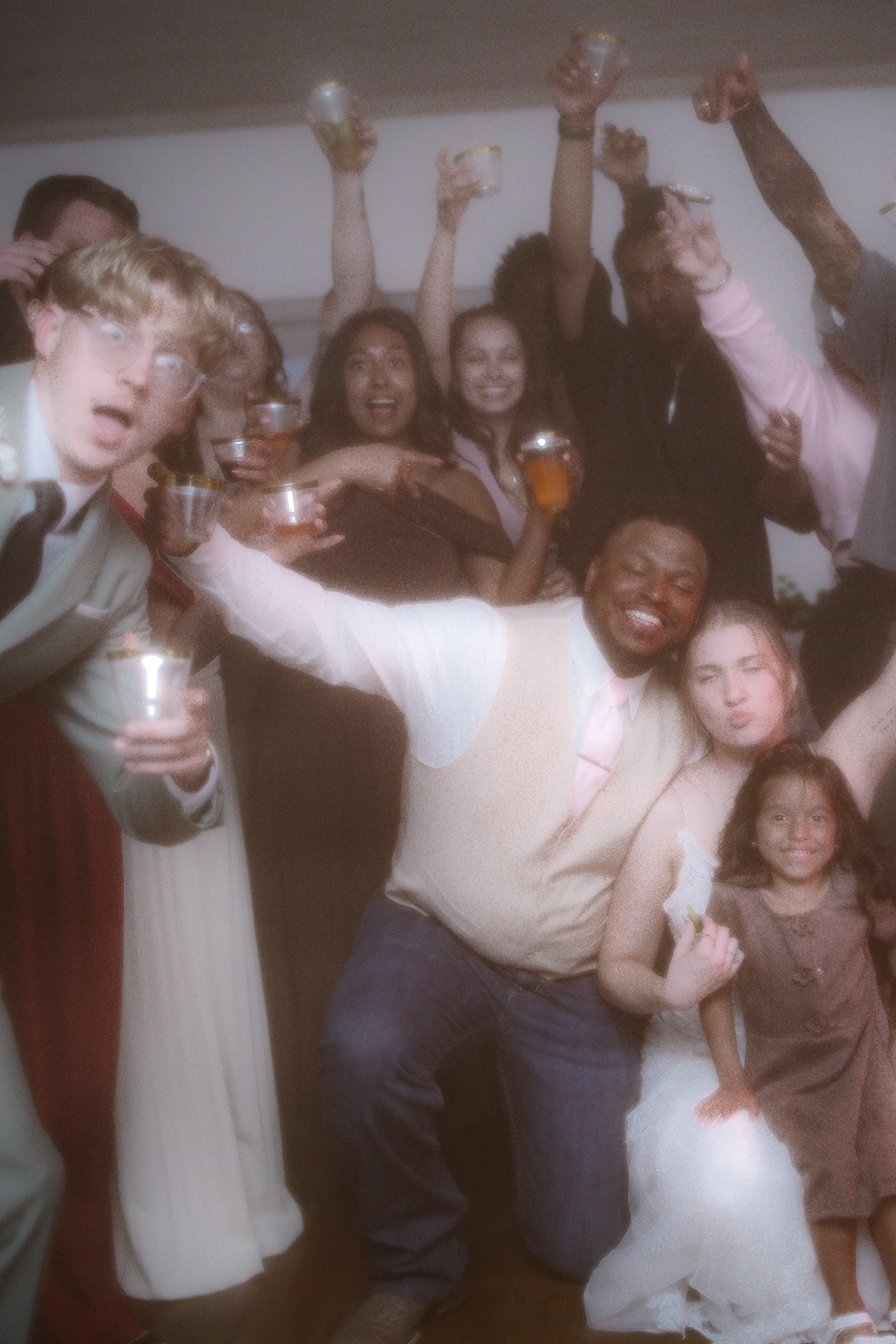 Documentary wedding reception moment filled with movement and celebration