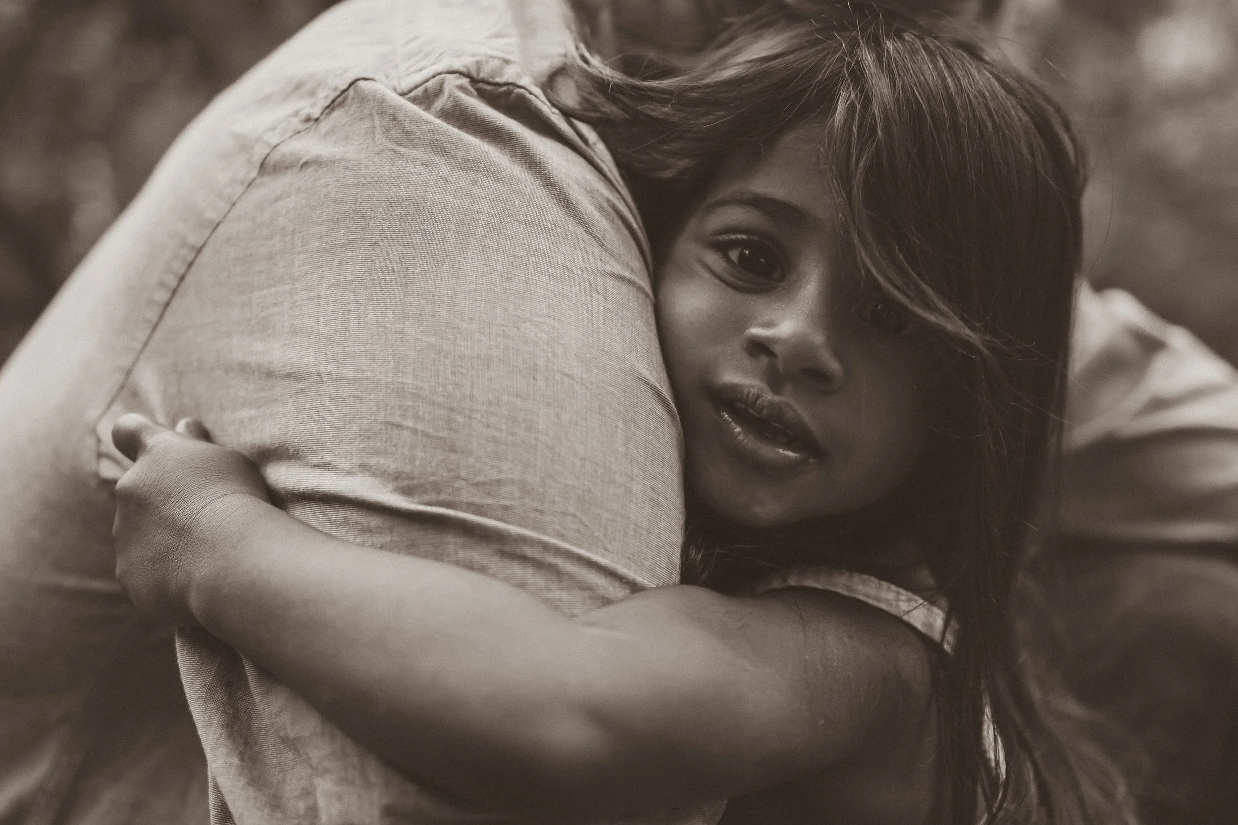Parents dancing together during a family session