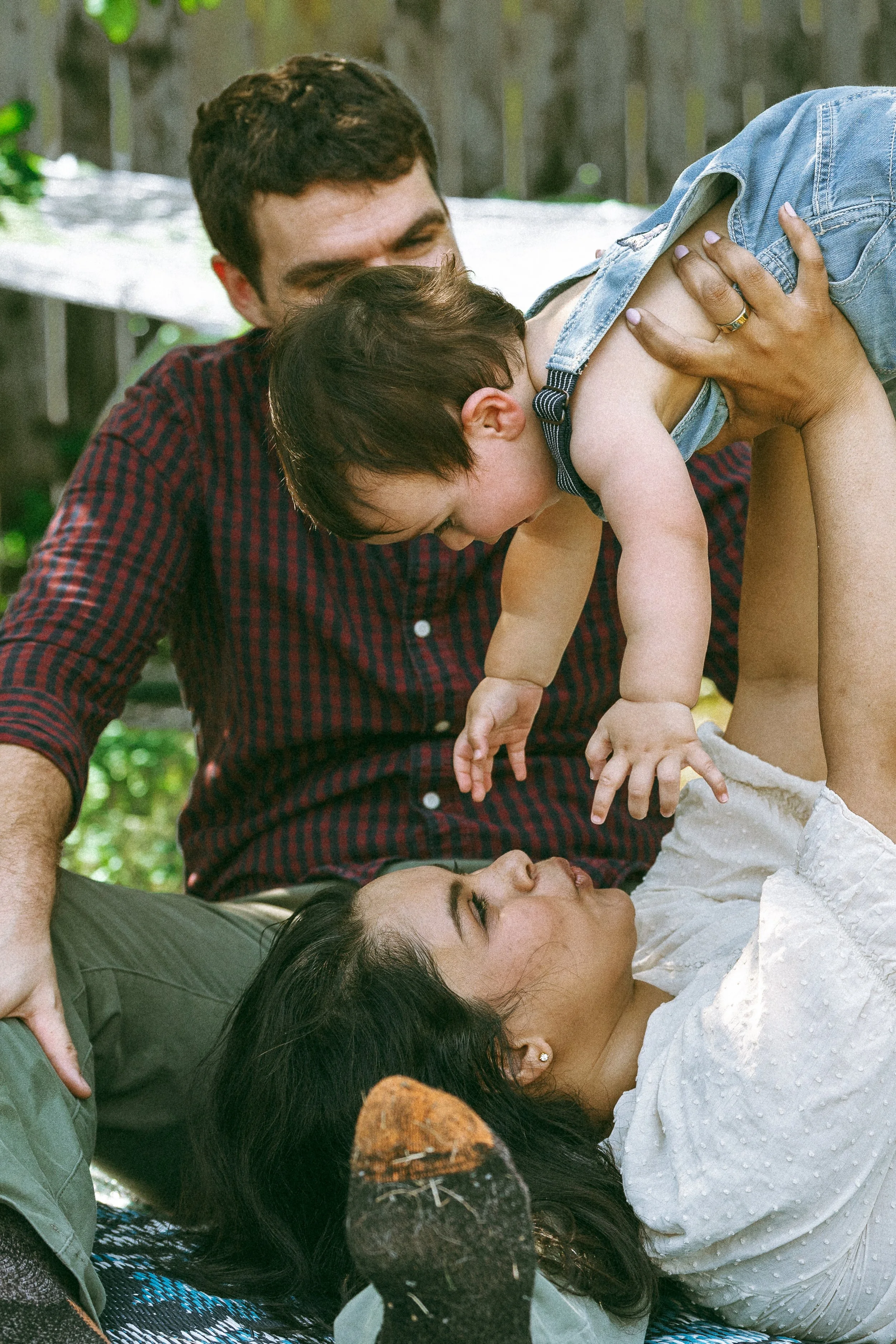Family spending the morning together in their backyard during a documentary family photo session