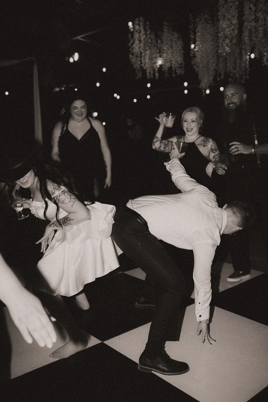 candid photo of bride dancing at wedding