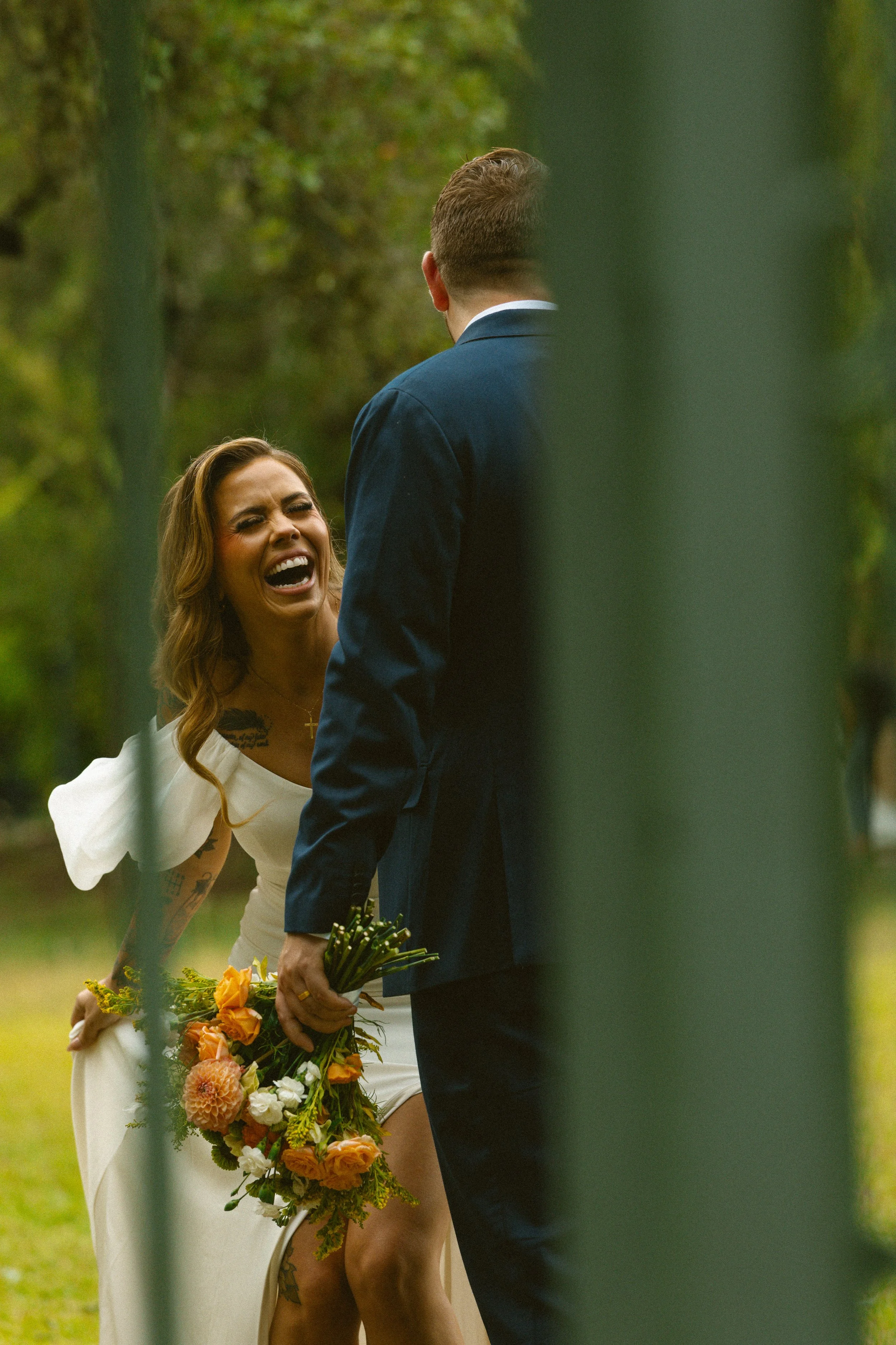 Bride laughing at groom, greenhouse, The Ma Mansion, Hill Country, Texas