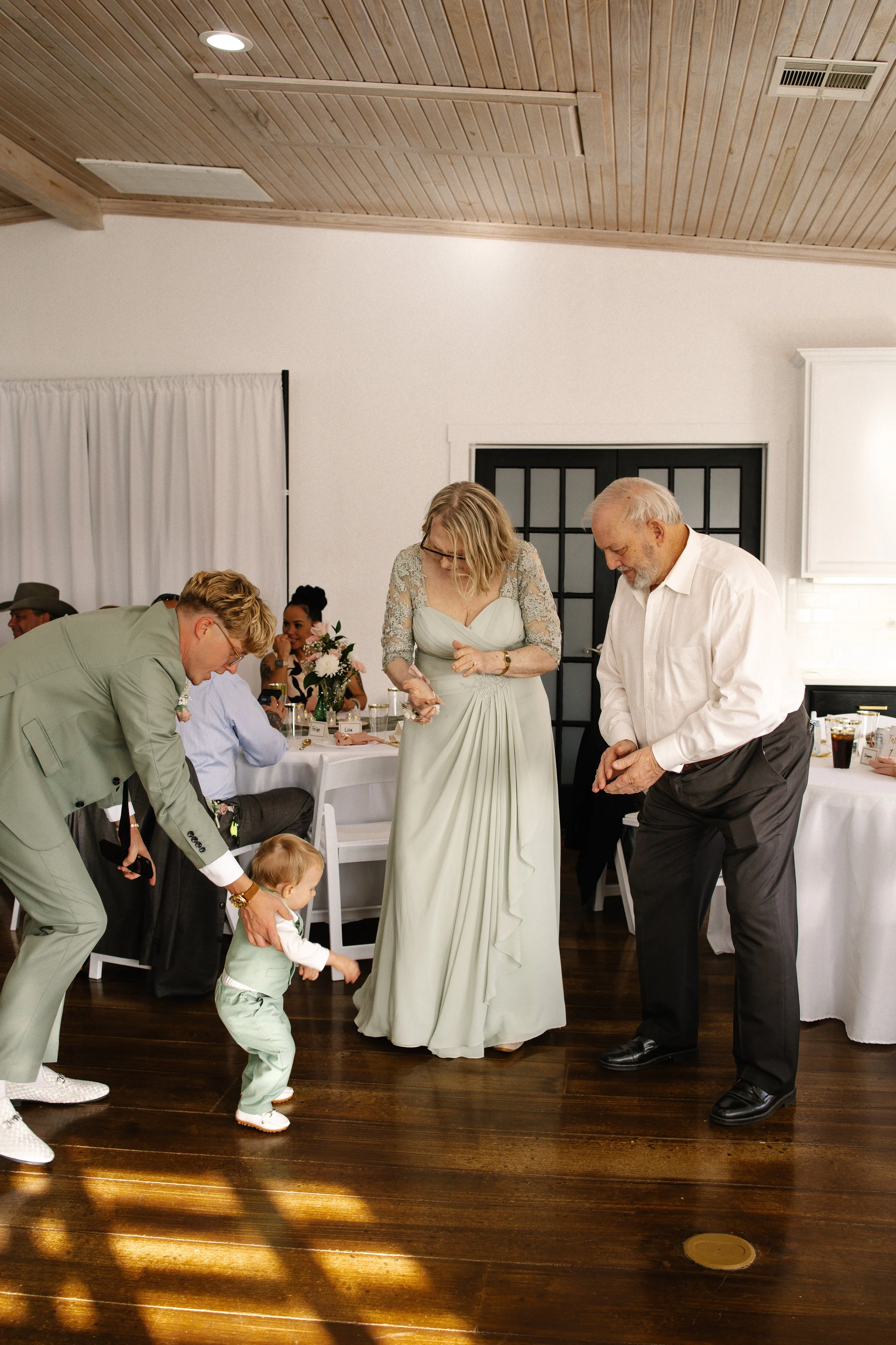 Toddler dancing at wedding