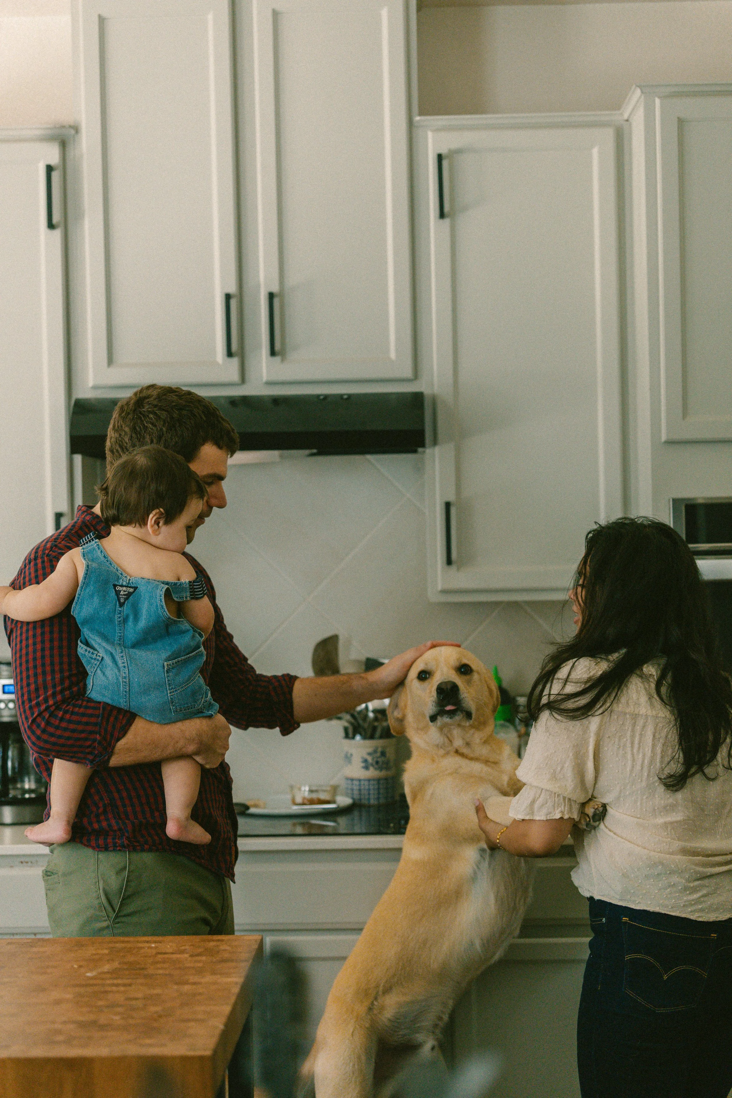 Family naturally interacting together during a lifestyle family photography session