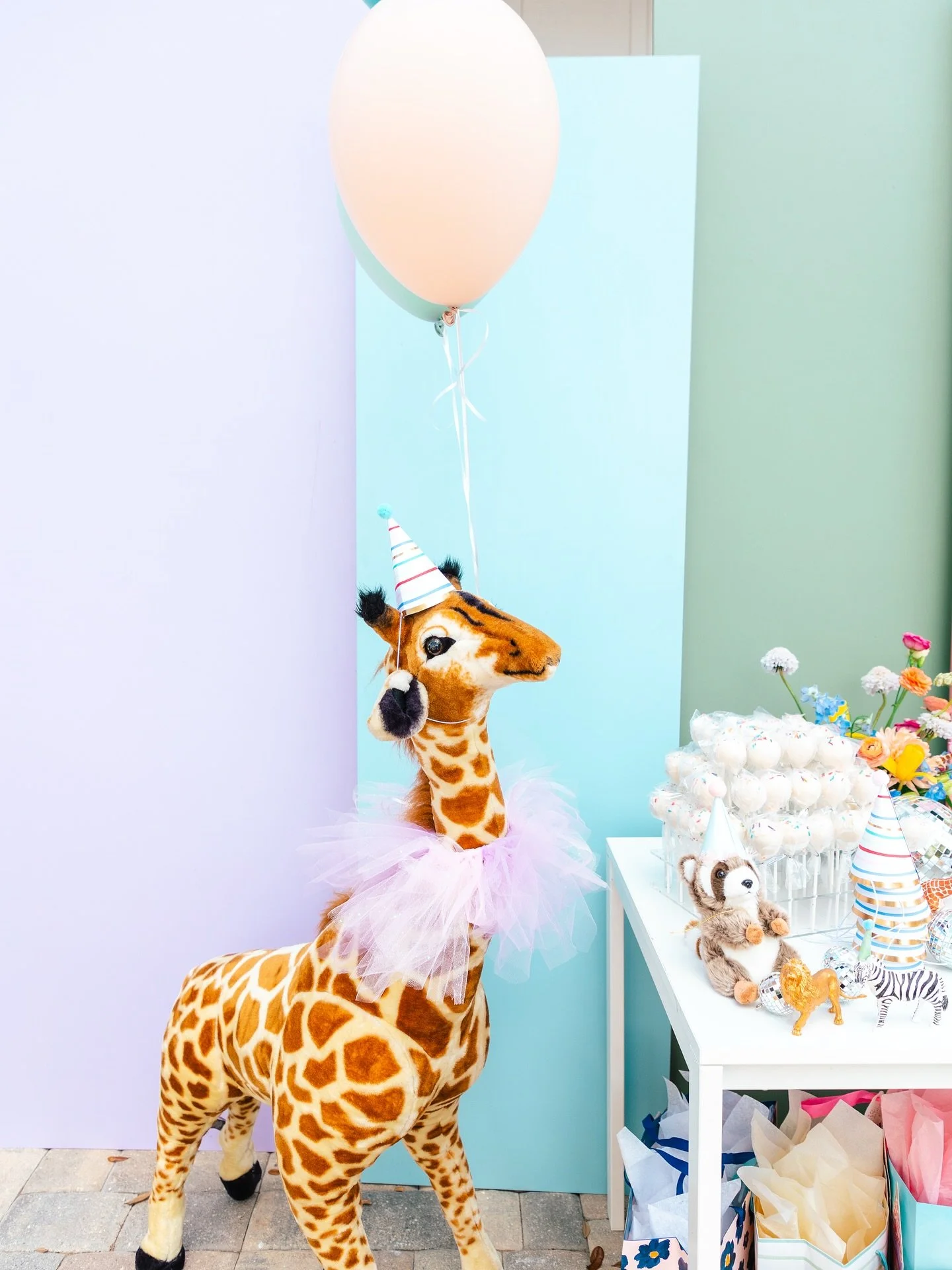 A pop of color makes all the difference! 🎈
We designed this custom backdrop in varying heights and soft pastel hues to be the perfect centerpiece for the dessert table &mdash; and the whole party. It pulled everything together so beautifully that I&