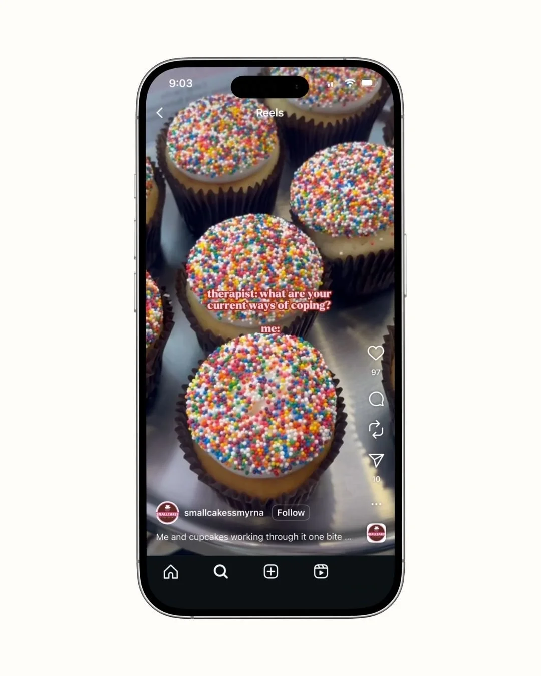 Close-up of cupcakes with colorful sprinkles on top, displayed on a tray.