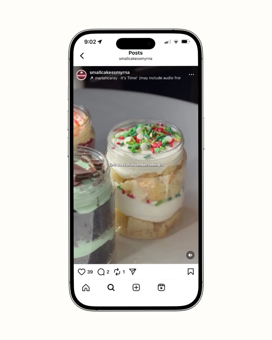 Close-up of a social media post showing three small jars filled with layered cake and decorated with sprinkles, with a focus on the middle jar topped with white frosting and colorful sprinkles.