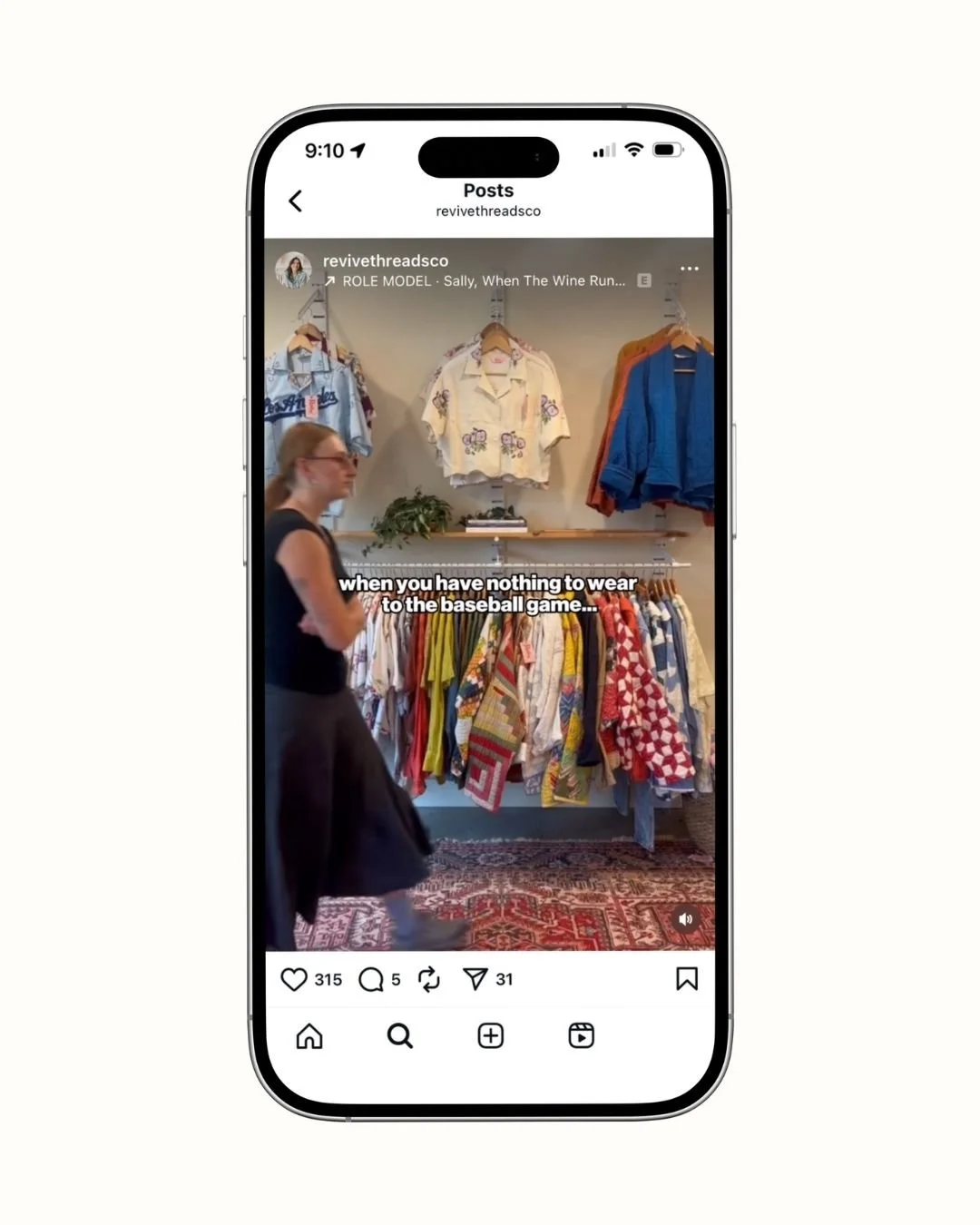 A person walking past a clothing rack with vintage shirts, jackets, and sweaters in a store. Subtitles read "when you have nothing to wear to the baseball game."