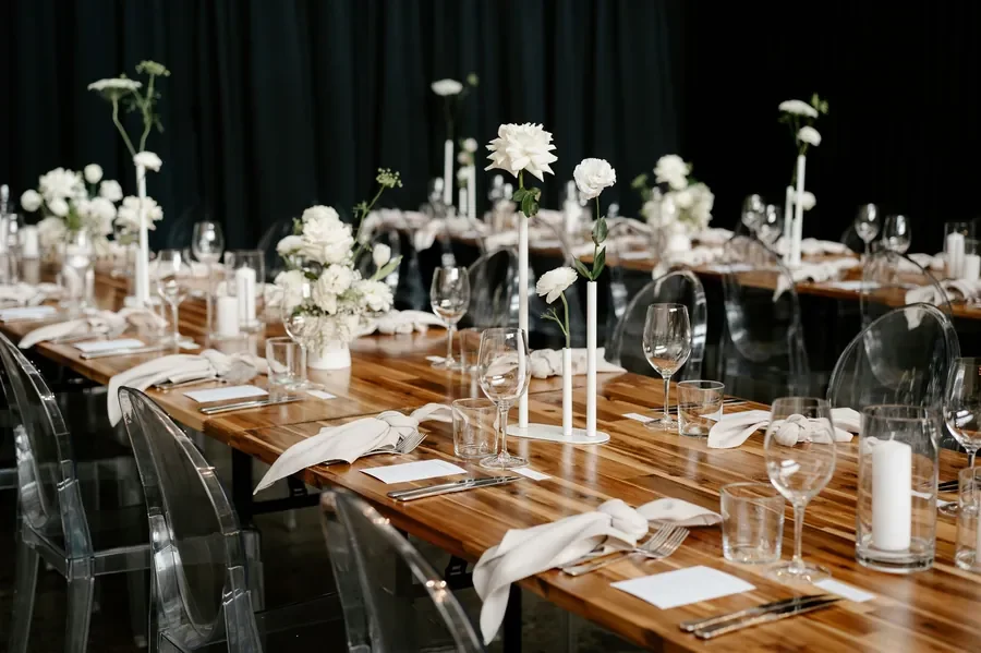Wedding table styling details with glassware, candles and white florals at The Refinery Brisbane